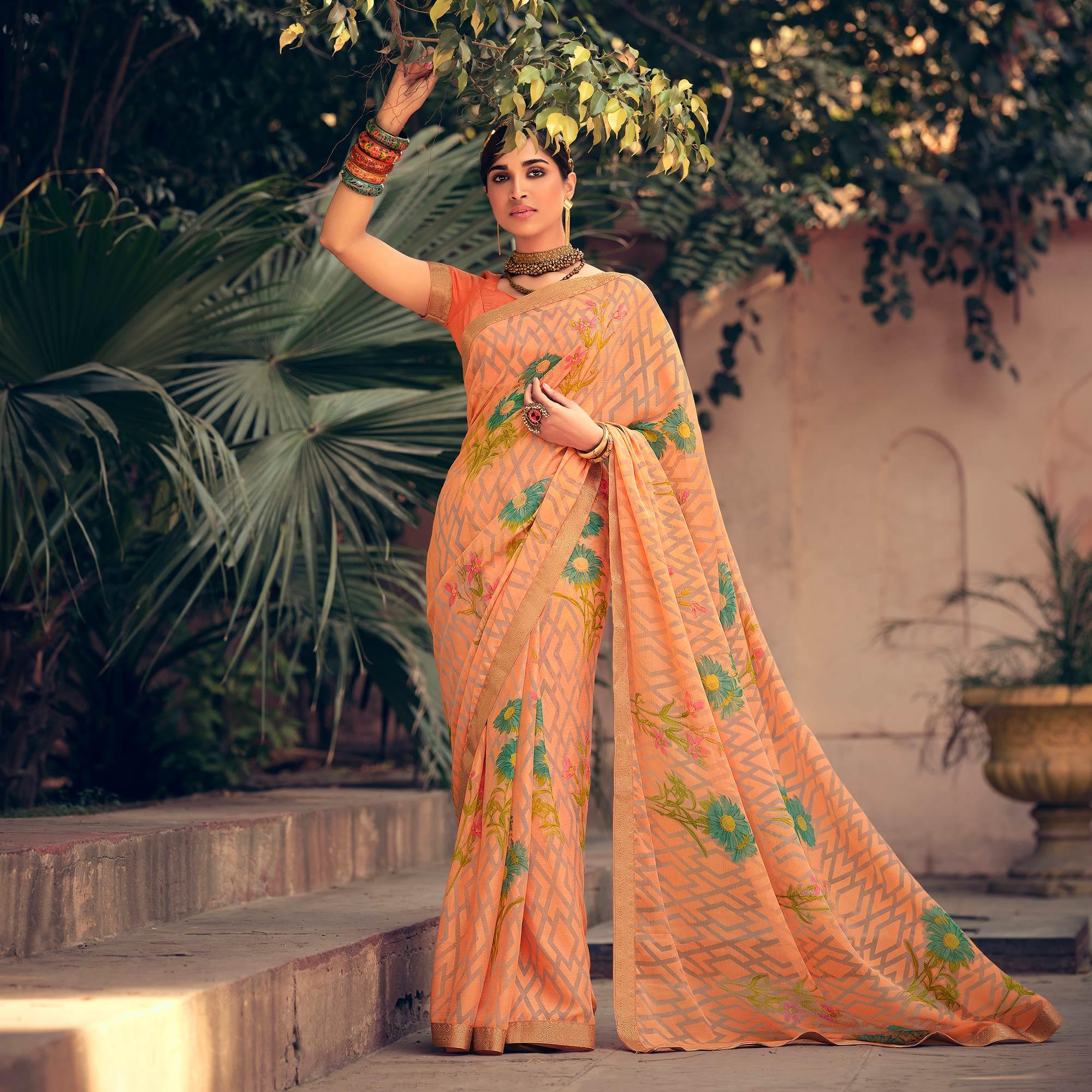 Oragne Casual Wear Floral Printed Chiffon Saree With Fancy Lace - Peachmode