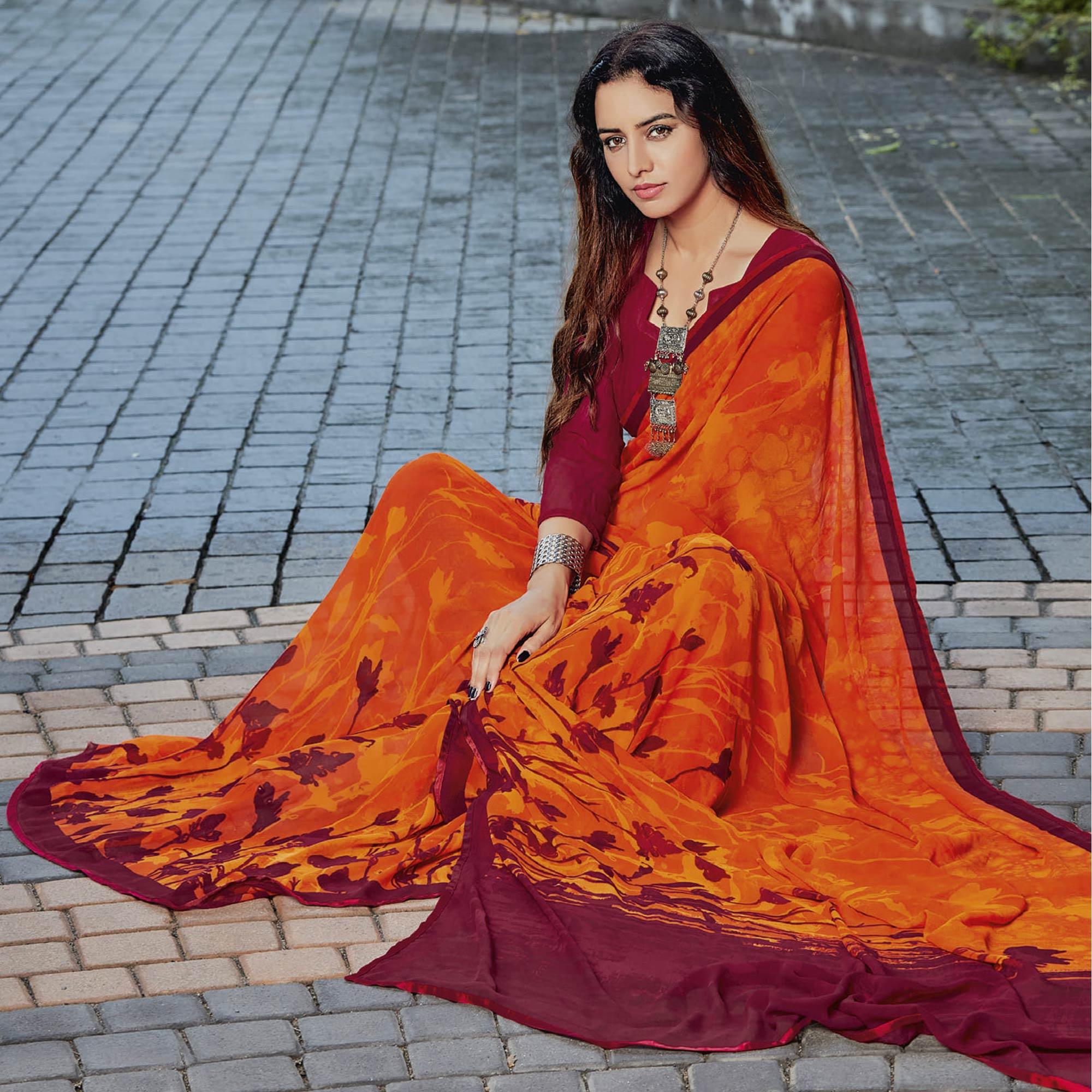 Orange & Maroon Casual Wear Floral Printed Georgette Saree - Peachmode