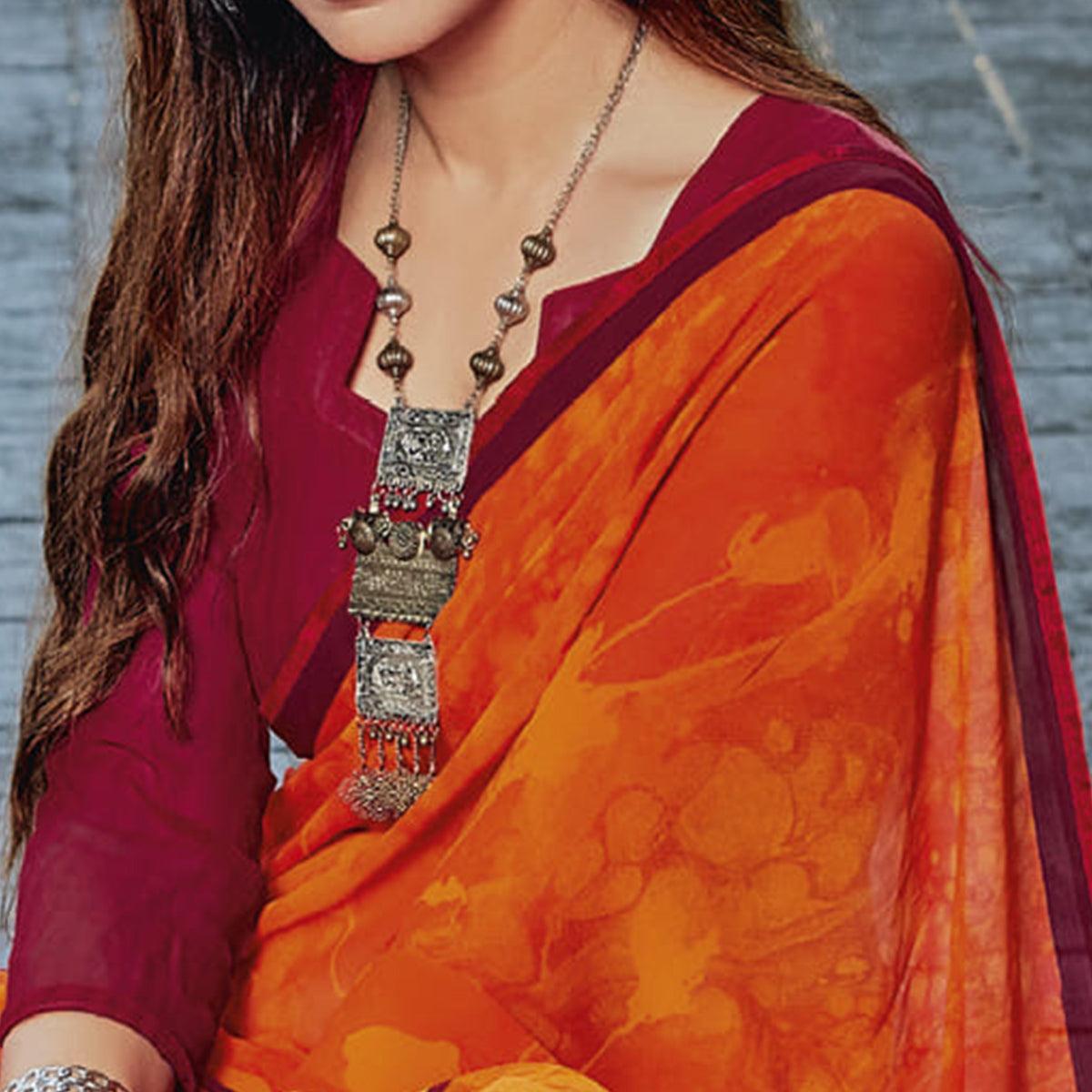 Orange & Maroon Casual Wear Floral Printed Georgette Saree - Peachmode