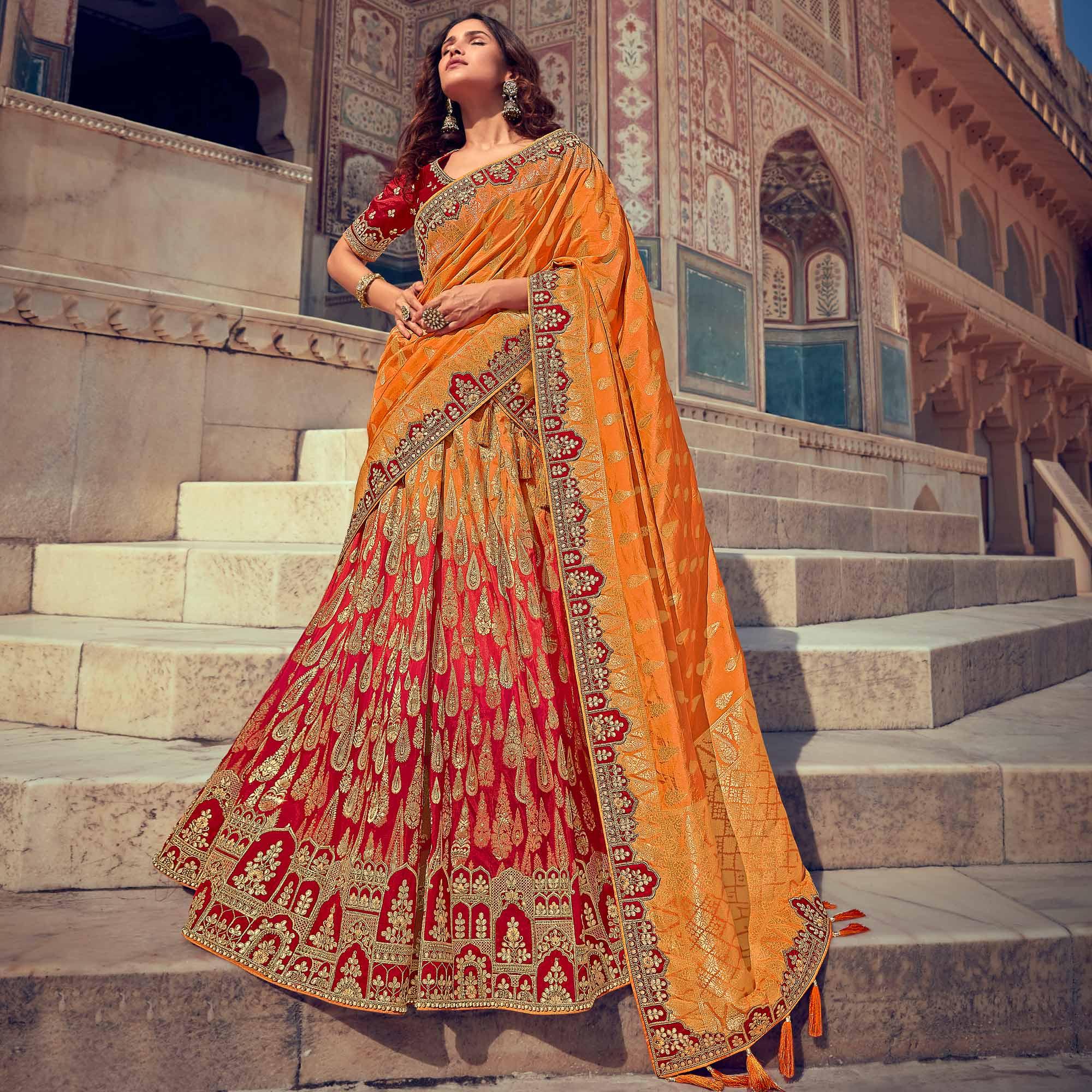 Orange & Red Wedding Wear Woven & Embroidered Silk Lehenga Choli - Peachmode