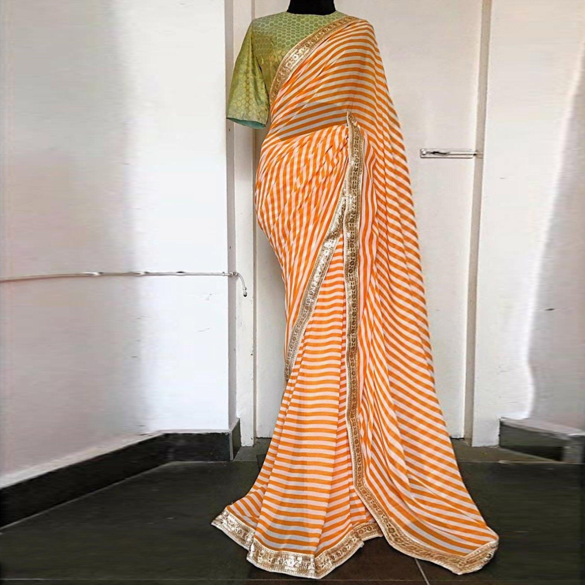 Orange & White Casual Wear Printed Georgette Saree - Peachmode