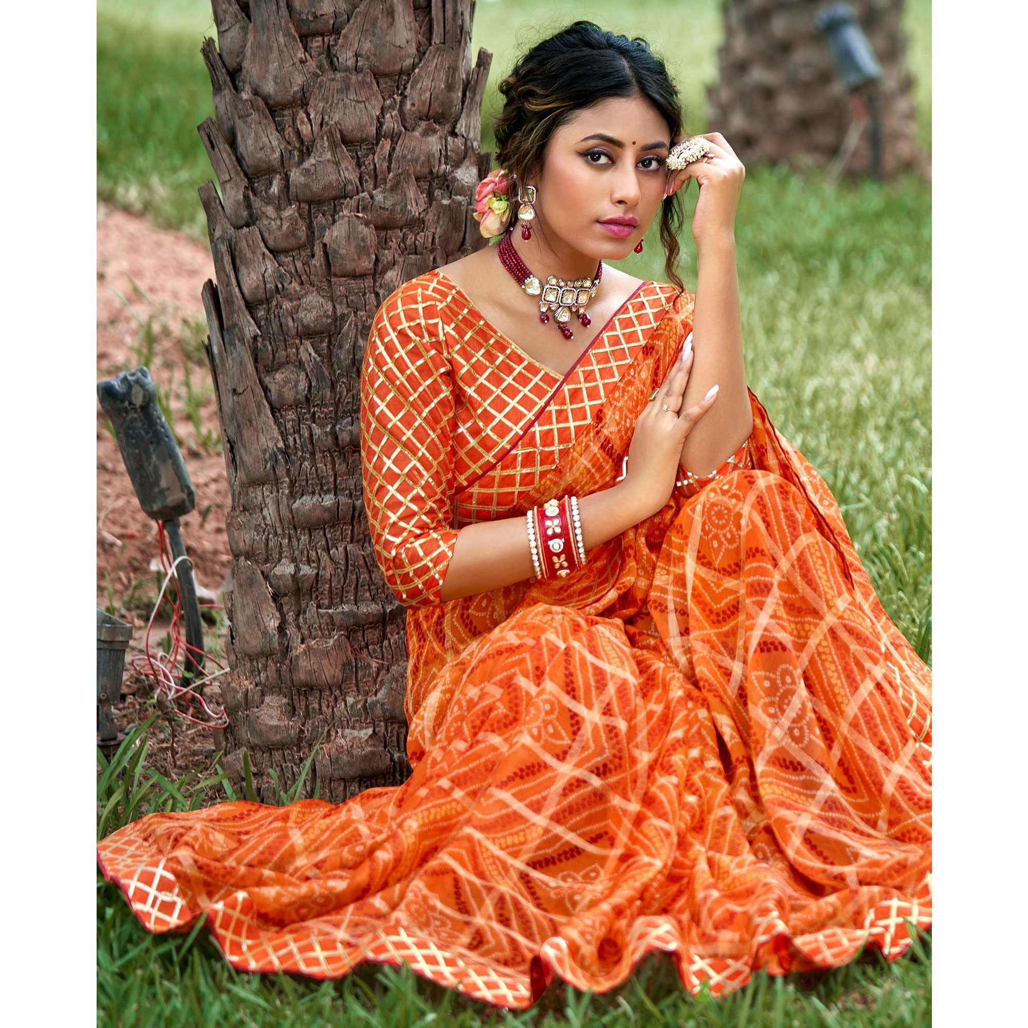 Orange Bandhani Printed-Checks Weaving Chiffon Saree - Peachmode