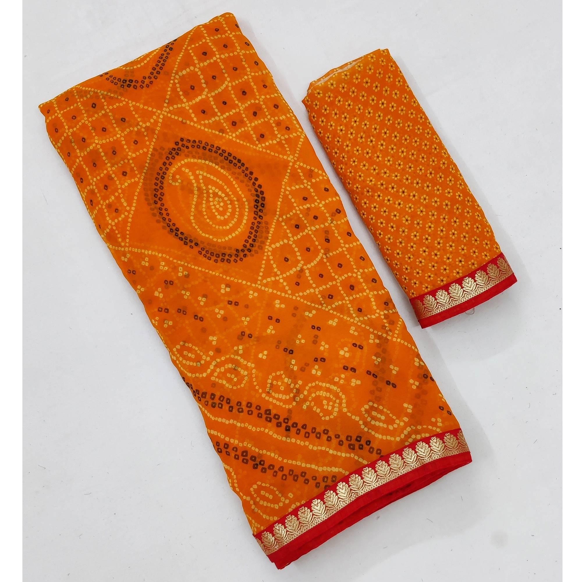 Orange Bandhani Printed Georgette Saree With Fancy Border - Peachmode