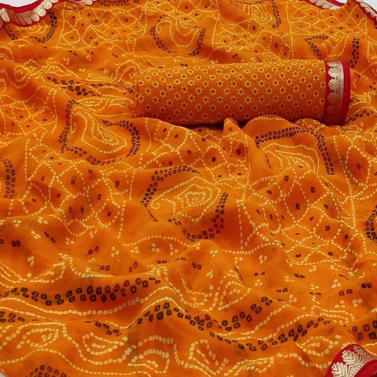 Orange Bandhani Printed Georgette Saree With Fancy Border - Peachmode