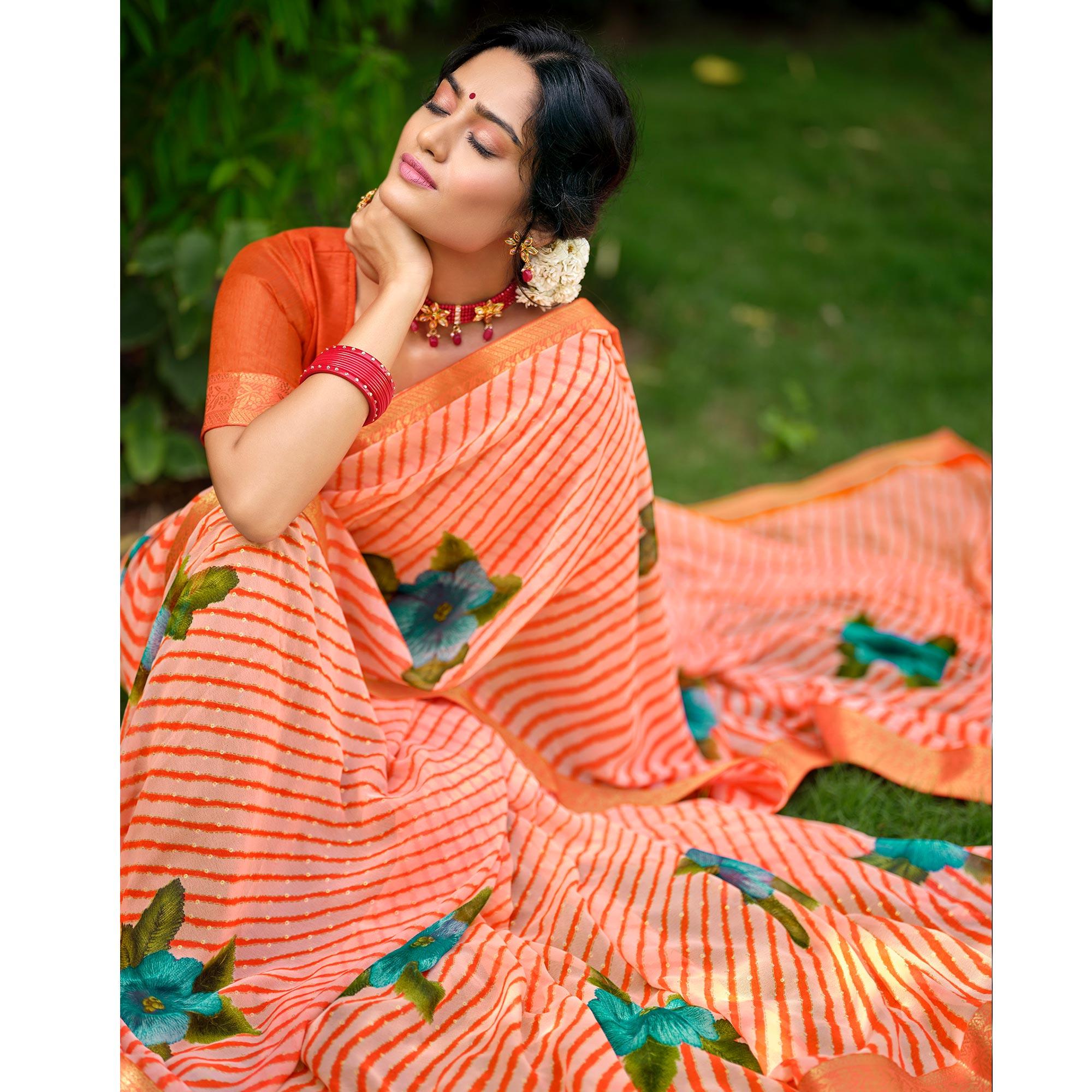 Orange Casual Wear Floral With Striped Printed Georgette Saree - Peachmode