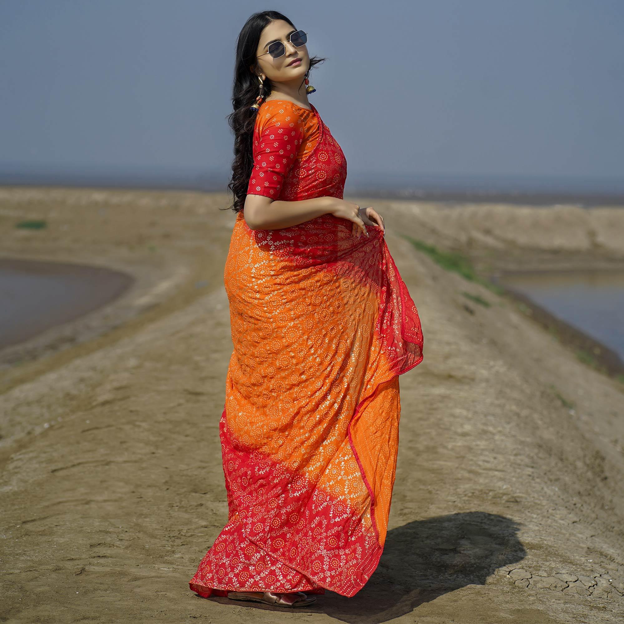 Orange Casual Wear Foil Printed Crepe Saree - Peachmode