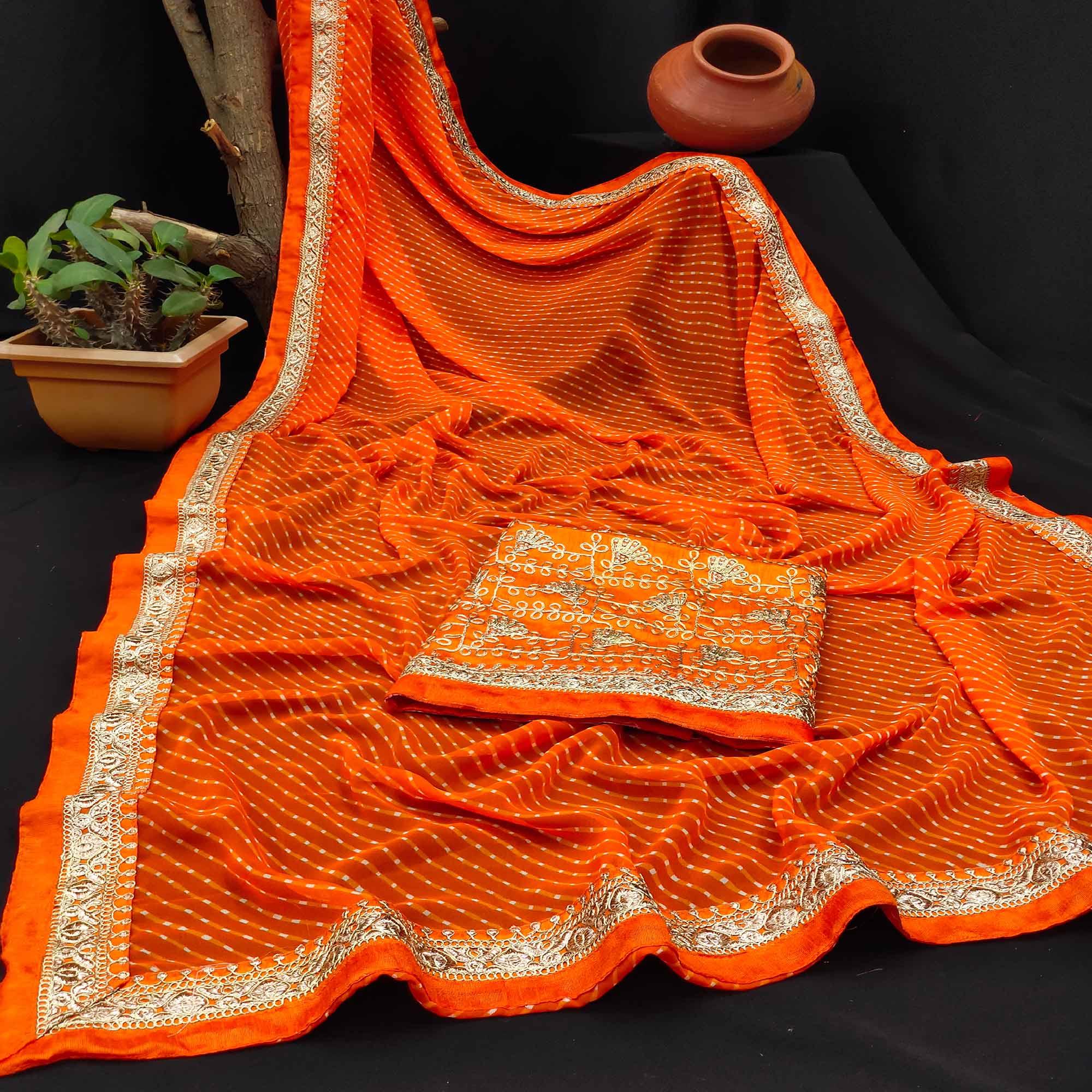 Orange Festive Wear Printed With Lace Border Georgette Saree - Peachmode