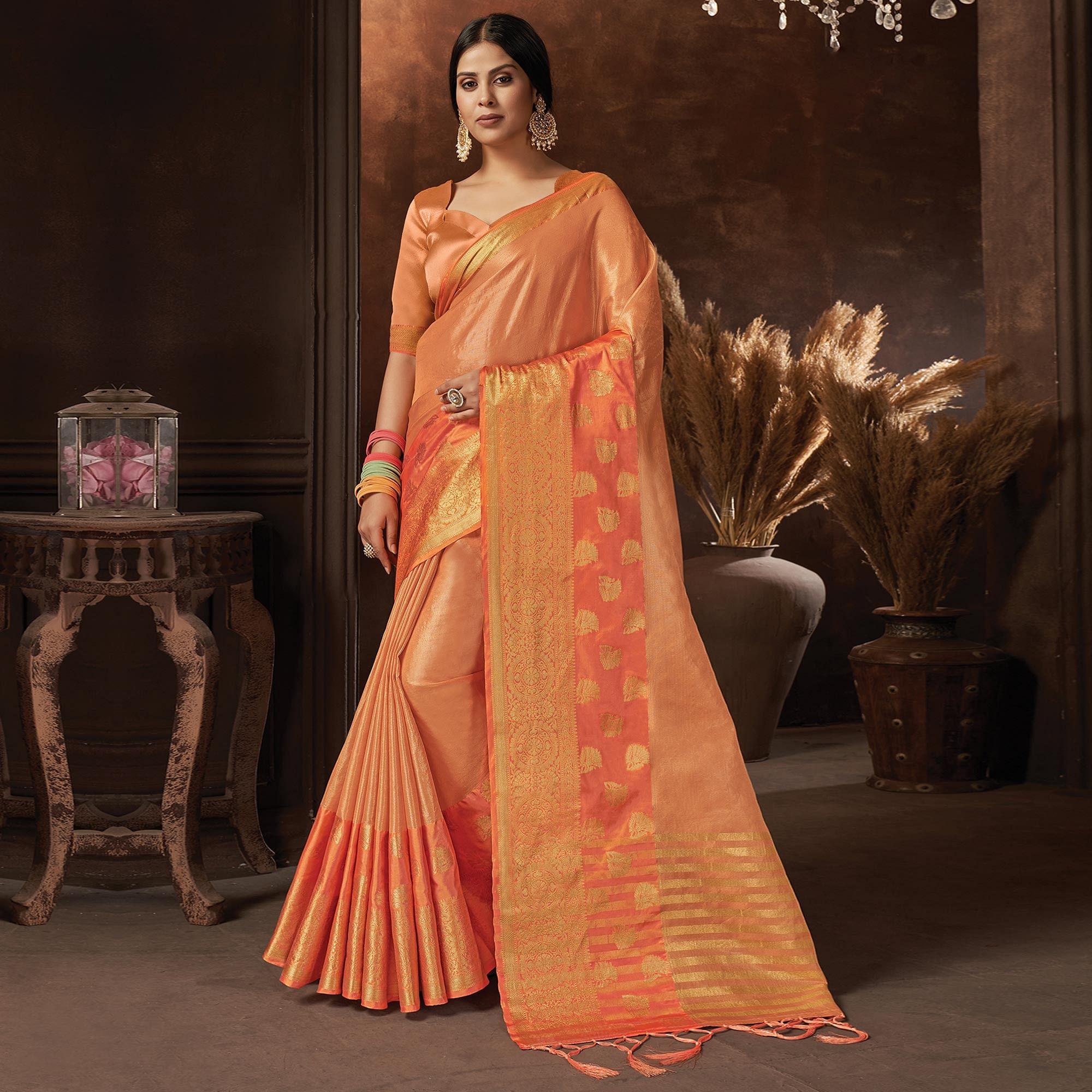 Orange Festive Wear Solid Organza Saree With Tassels - Peachmode