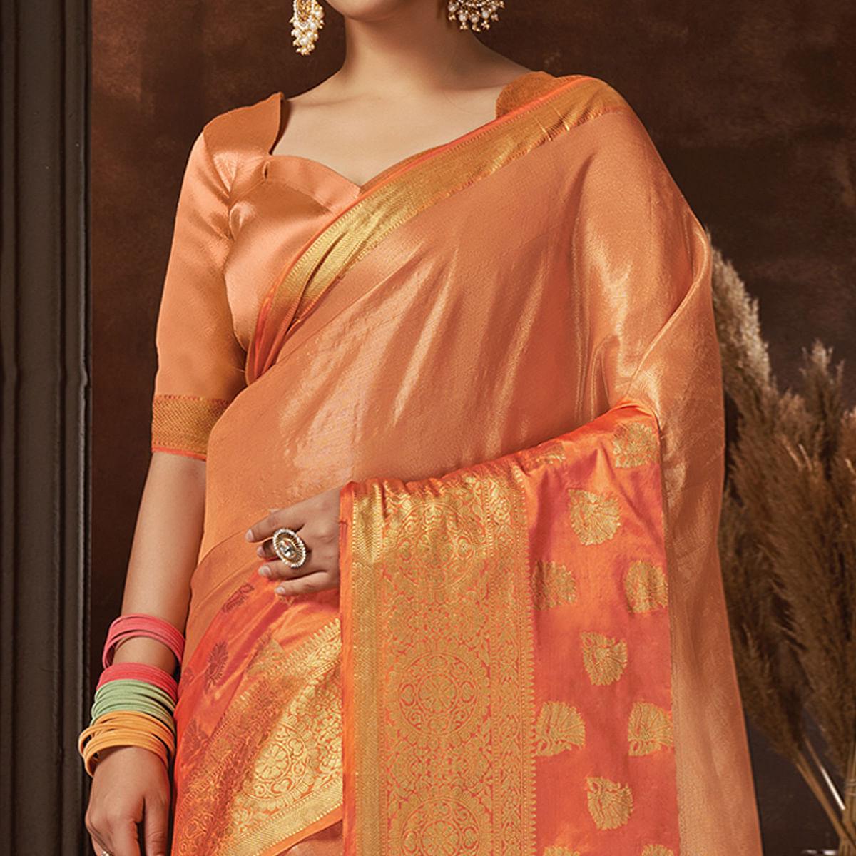 Orange Festive Wear Solid Organza Saree With Tassels - Peachmode