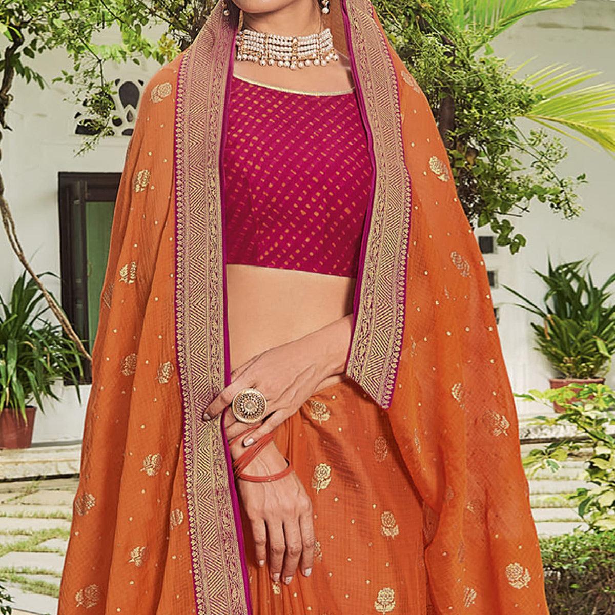 Orange Festive Wear Woven & Embelllished Chiffon Saree - Peachmode