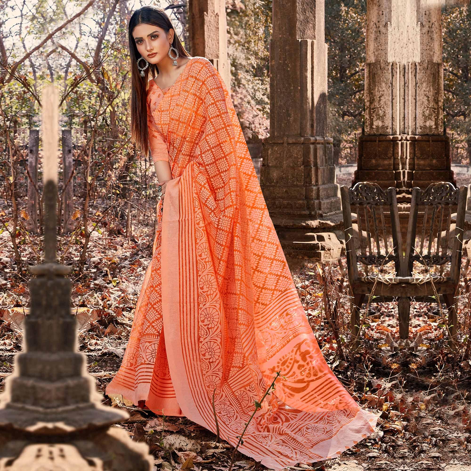 Orange Floral Printed Brasso Saree - Peachmode