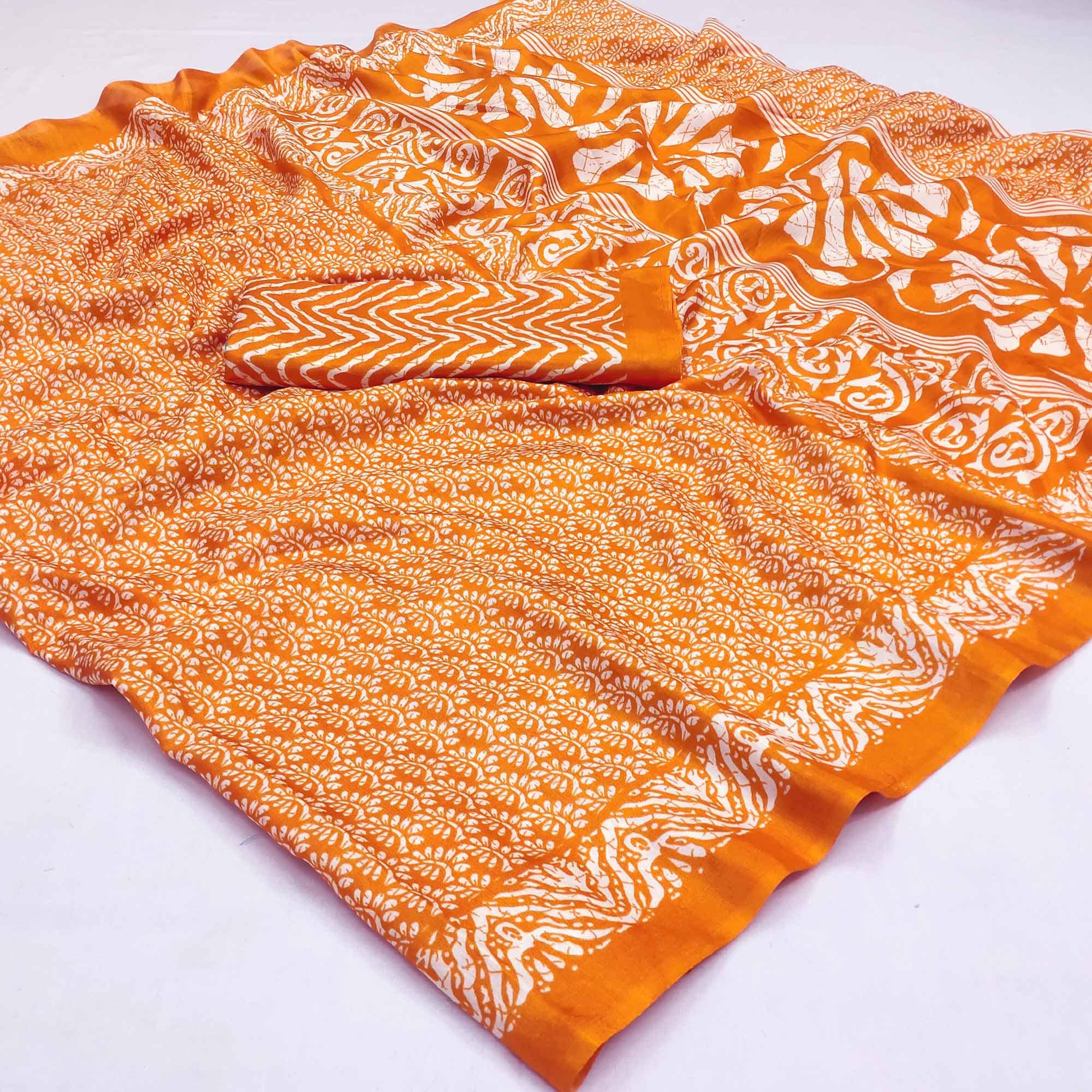 Orange Floral Printed Raw Silk Saree - Peachmode