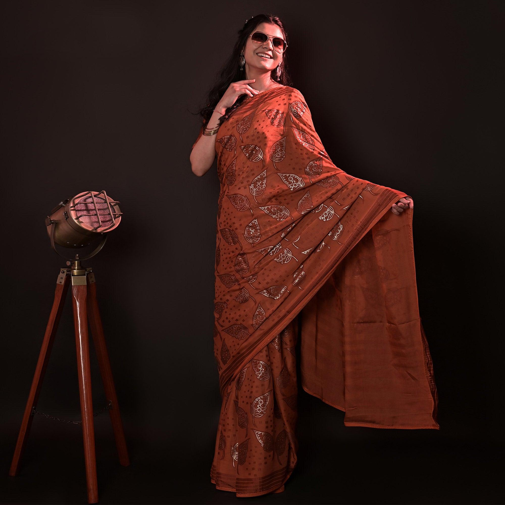 Orange Partywear Foil Printed Diamond Lace Brasso Saree - Peachmode