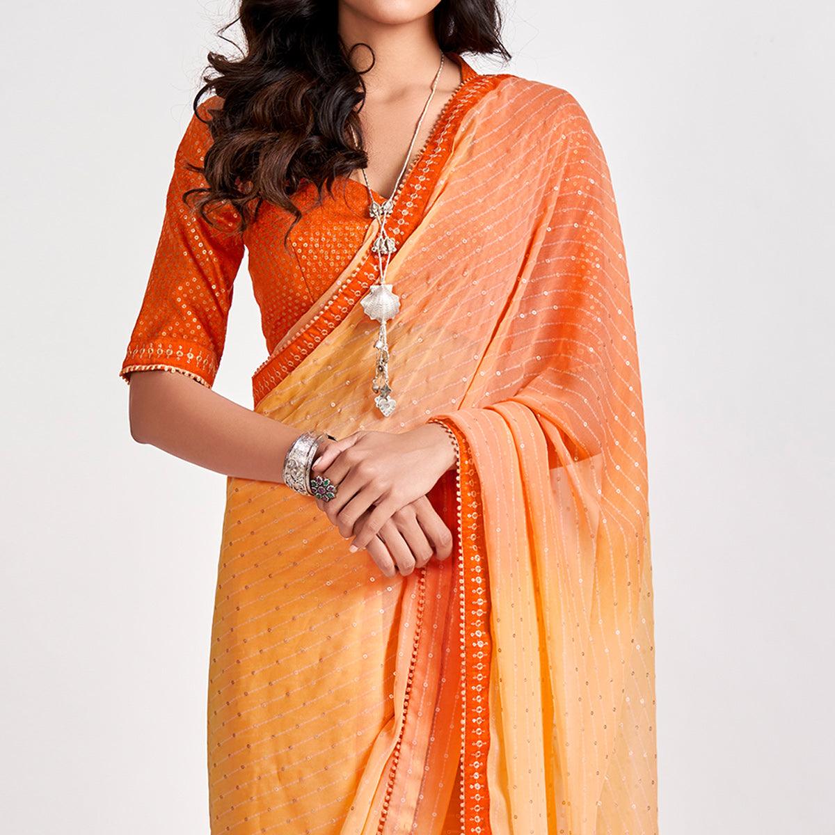 Orange Partywear Sequence Foil Printed Georgette Saree - Peachmode