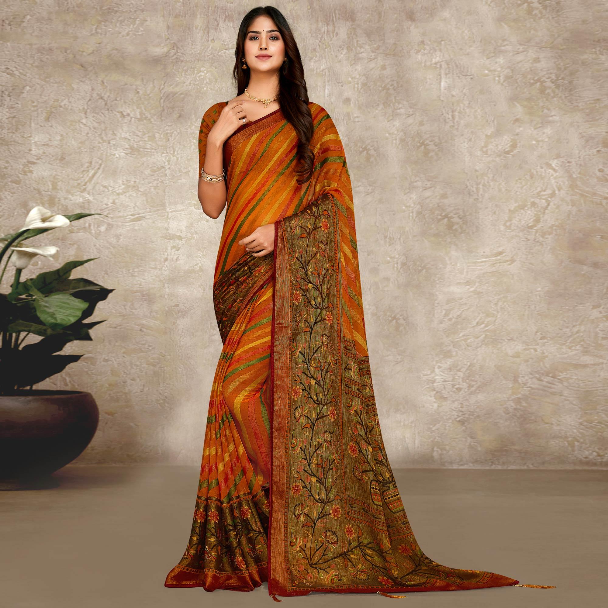 Orange Printed Brasso Saree With Tassels - Peachmode