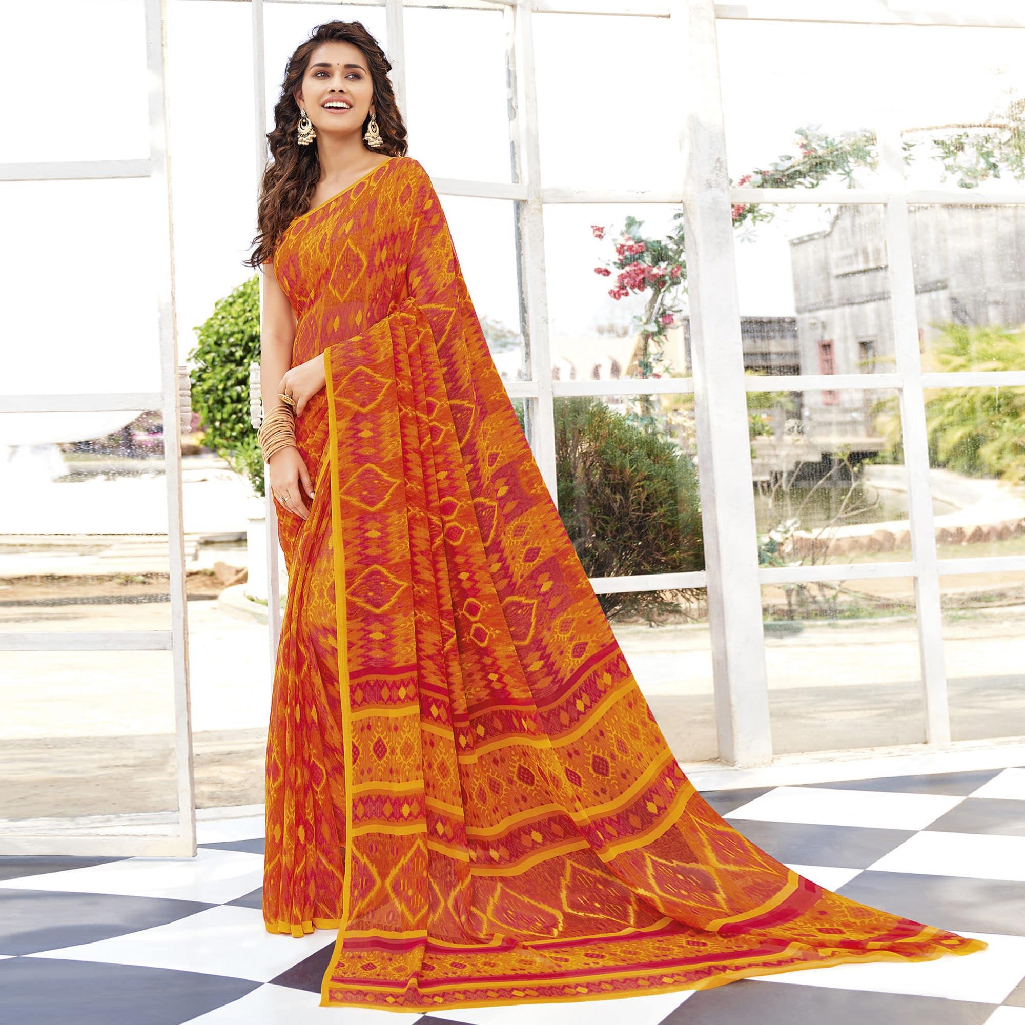 Orange Printed Georgette Saree - Peachmode