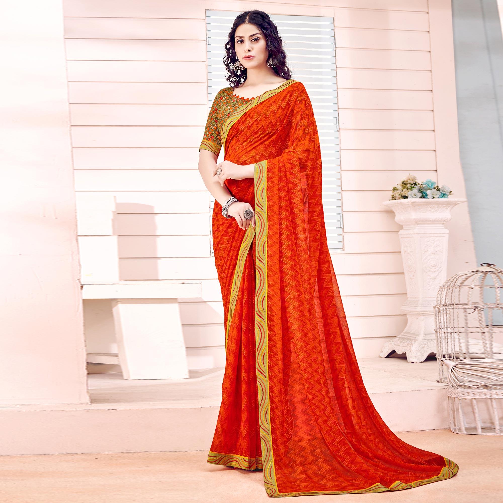 Orange Printed Georgette Saree - Peachmode