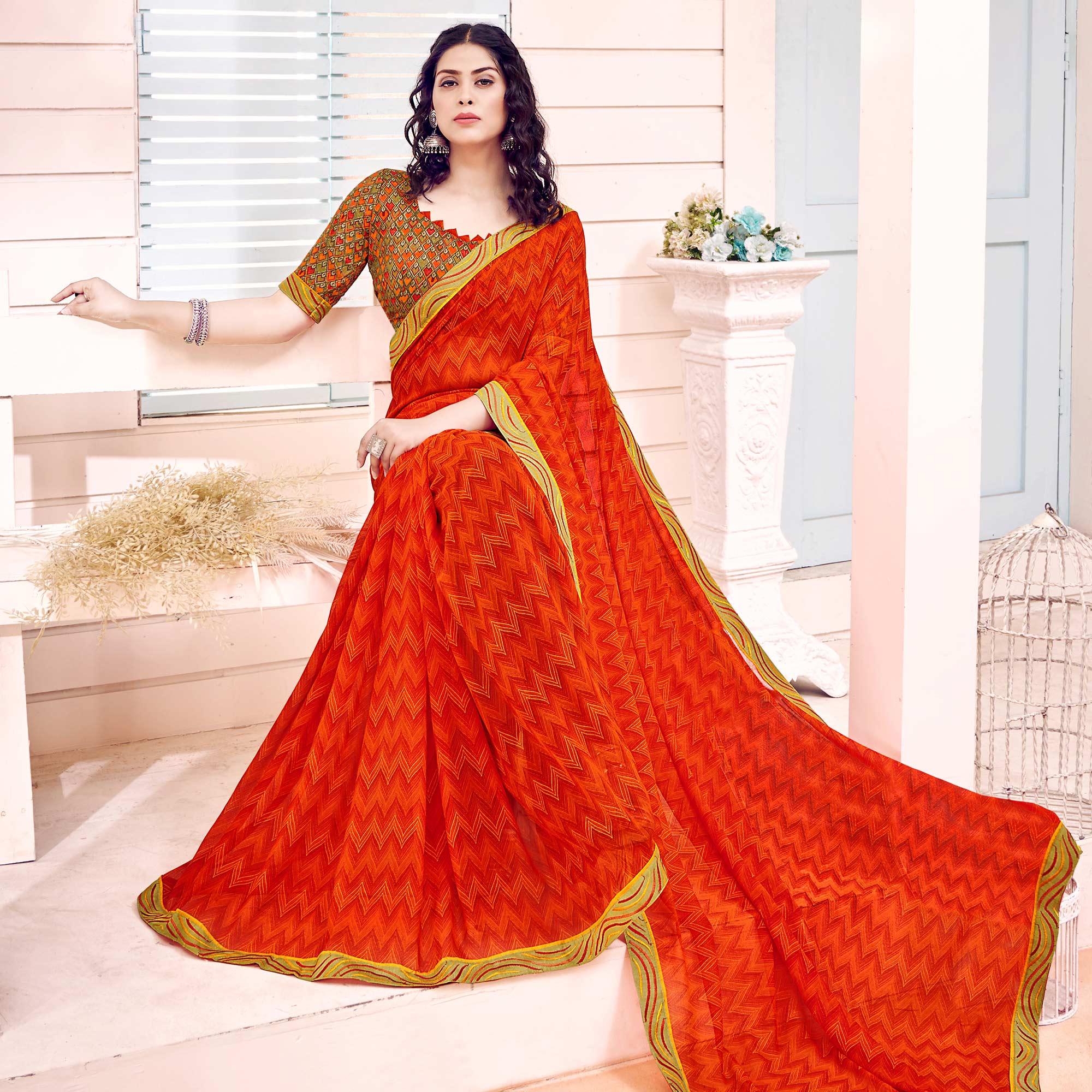 Orange Printed Georgette Saree - Peachmode