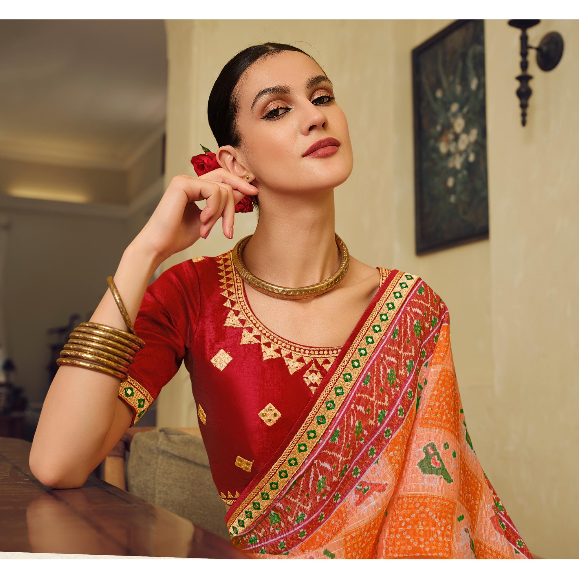 Orange Printed With Embellished Chiffon Saree With Tassels - Peachmode