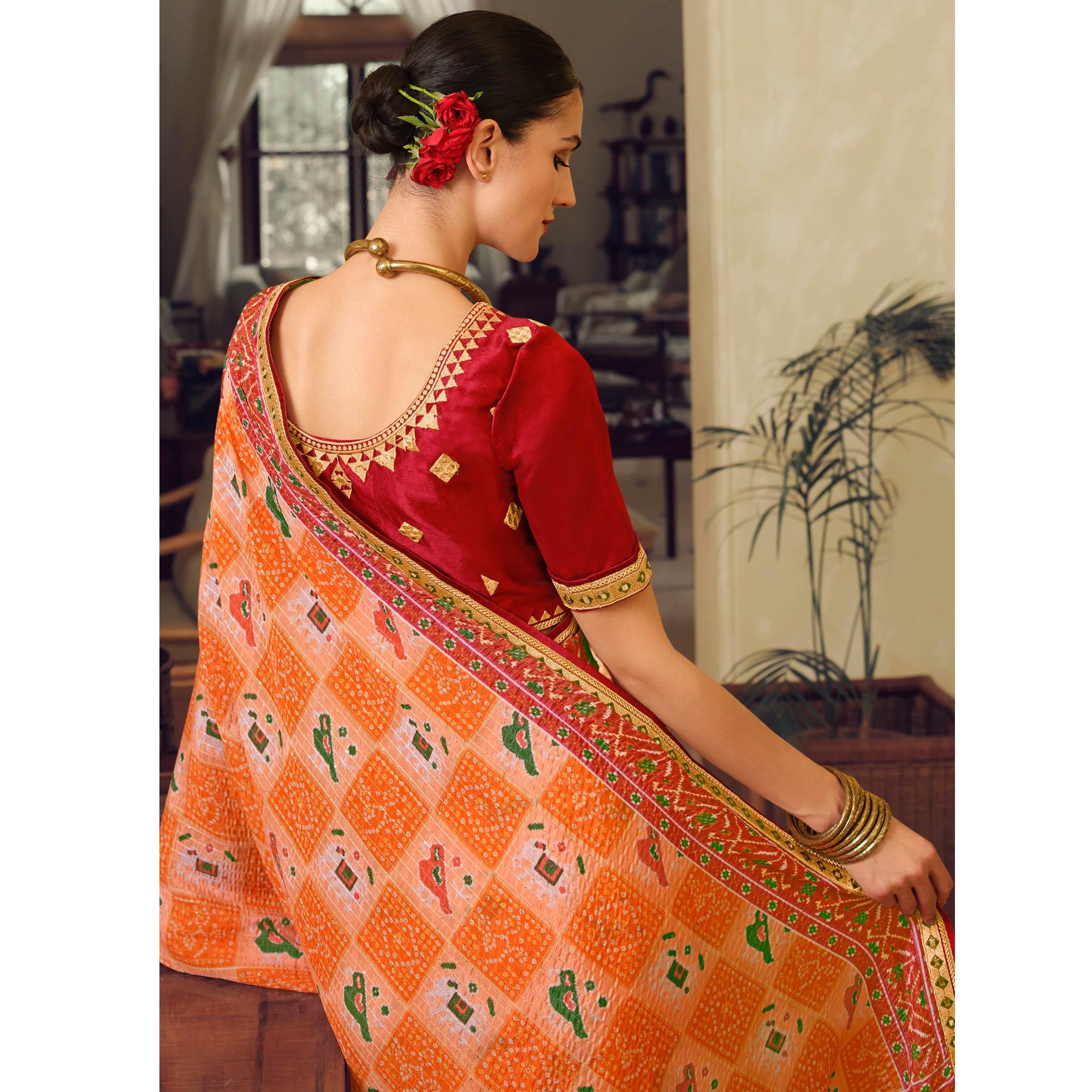 Orange Printed With Embellished Chiffon Saree With Tassels - Peachmode