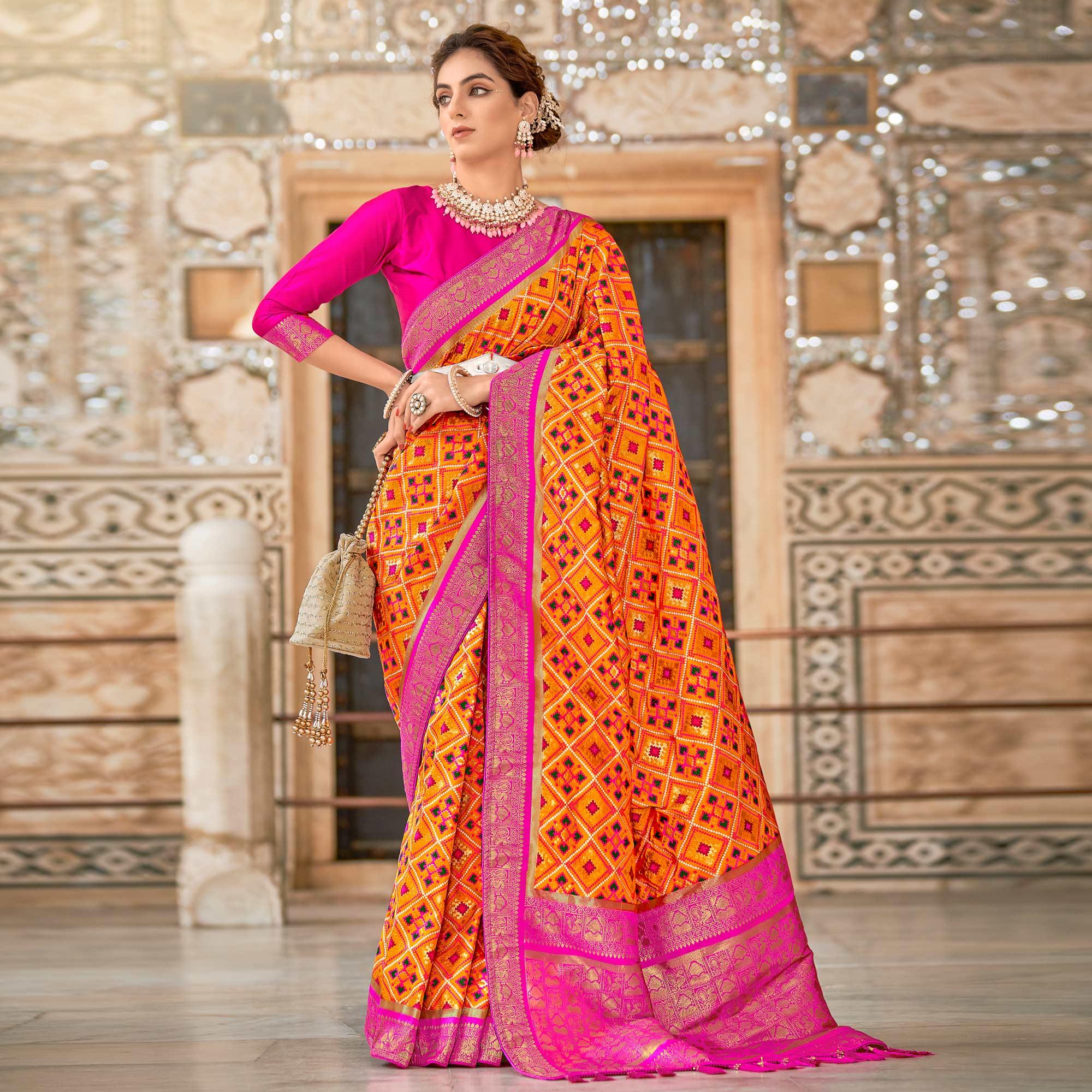 Orange Woven Art Silk Patola Saree With Tassels - Peachmode