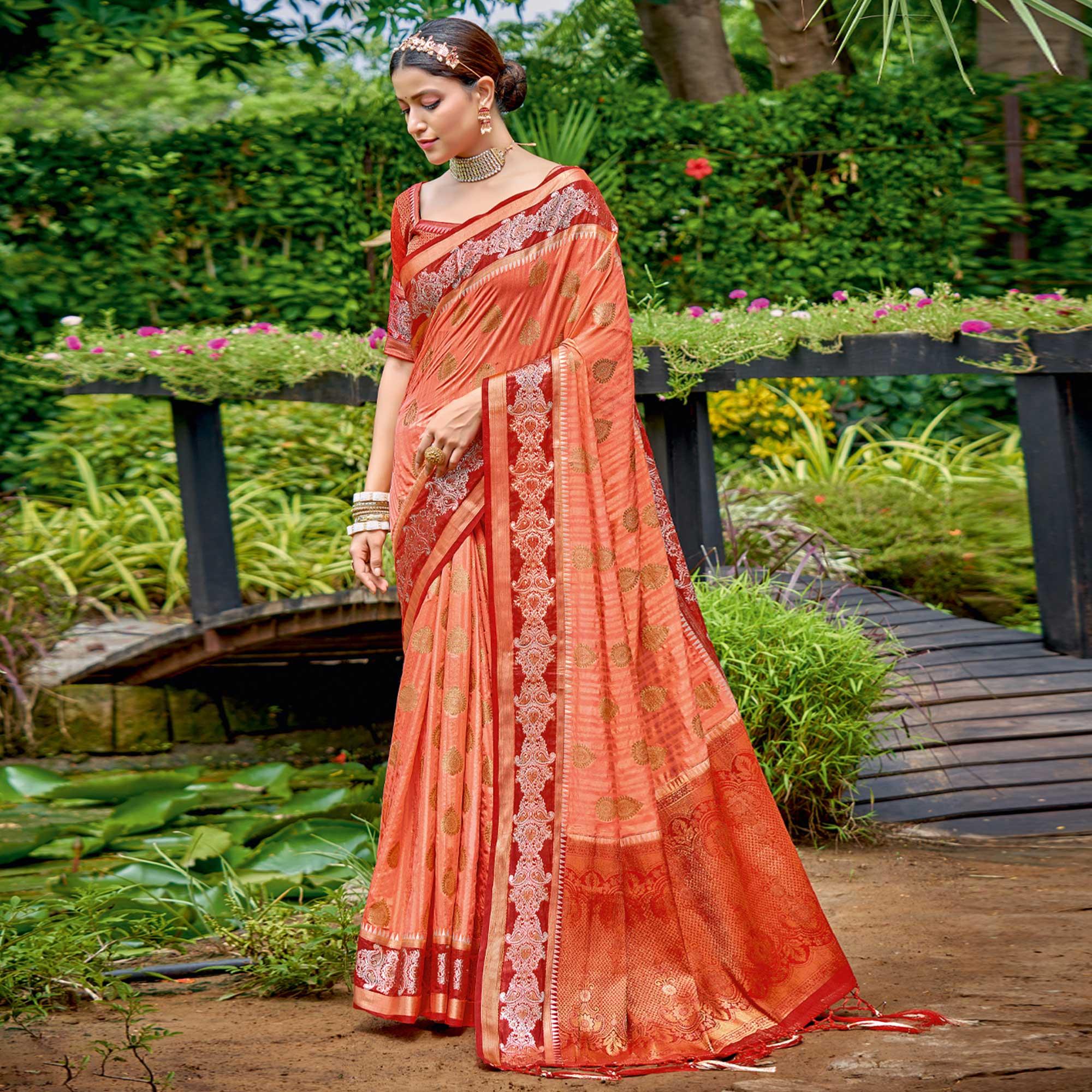 Orange Woven Banarasi Silk Saree With Tassels - Peachmode