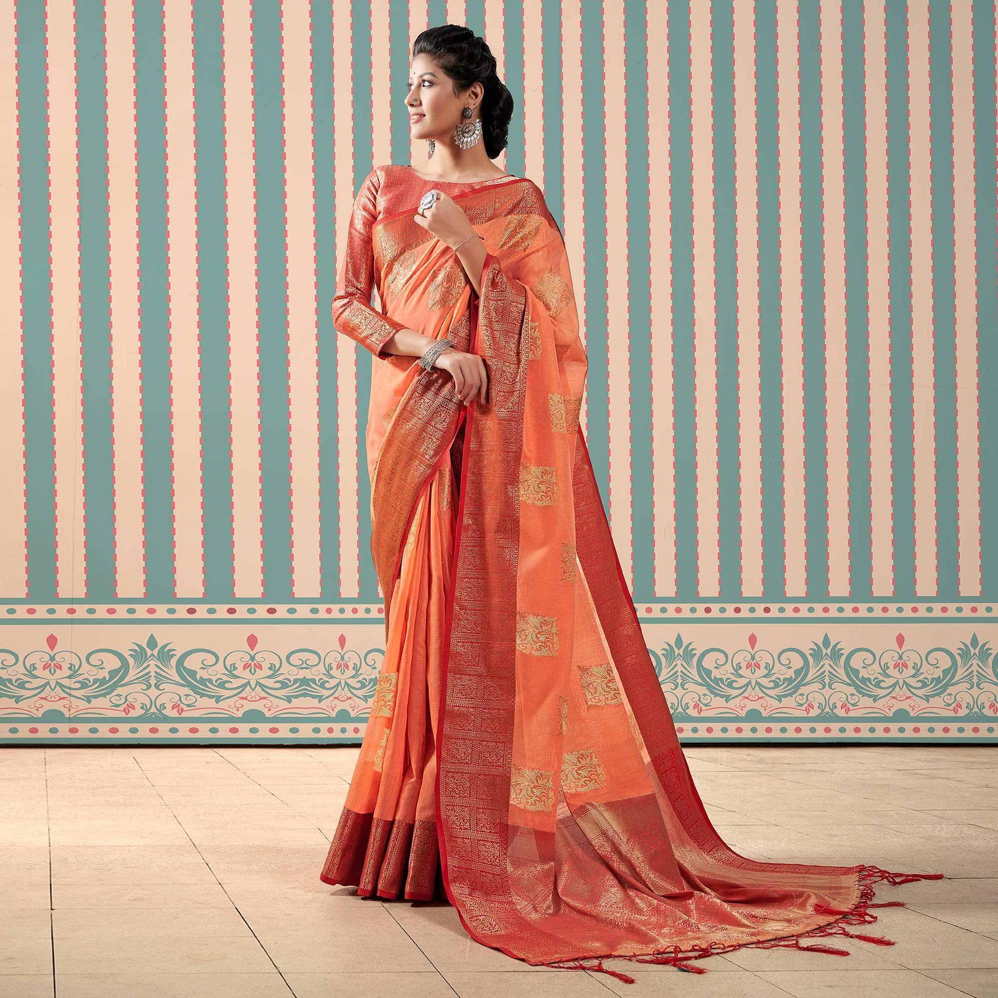 Orange Woven Linen Saree With Tassels - Peachmode