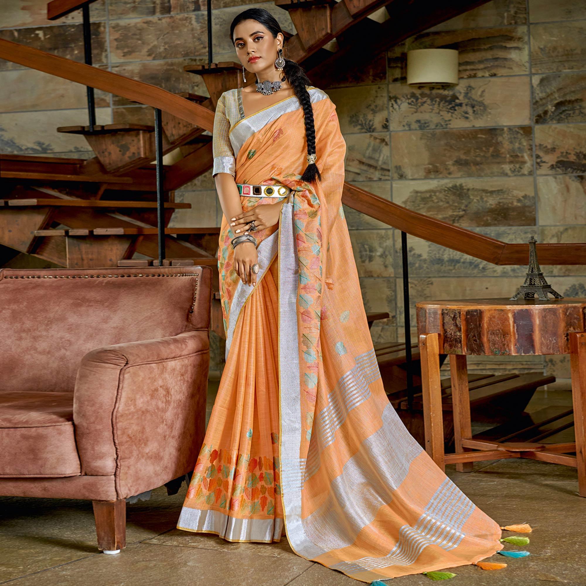 Orange Woven Linen Saree With Tassels - Peachmode