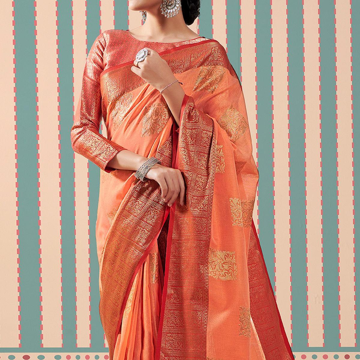 Orange Woven Linen Saree With Tassels - Peachmode