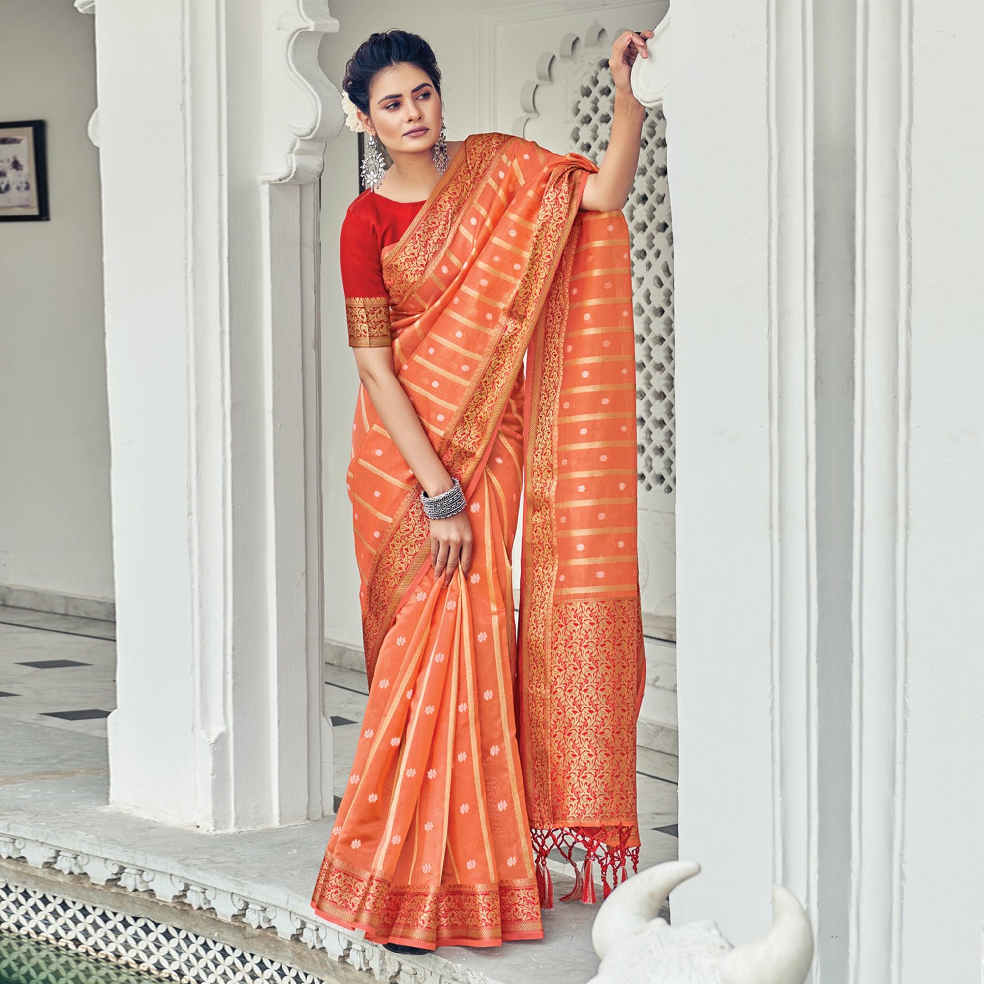 Orange Woven Organza Saree With Tassels - Peachmode