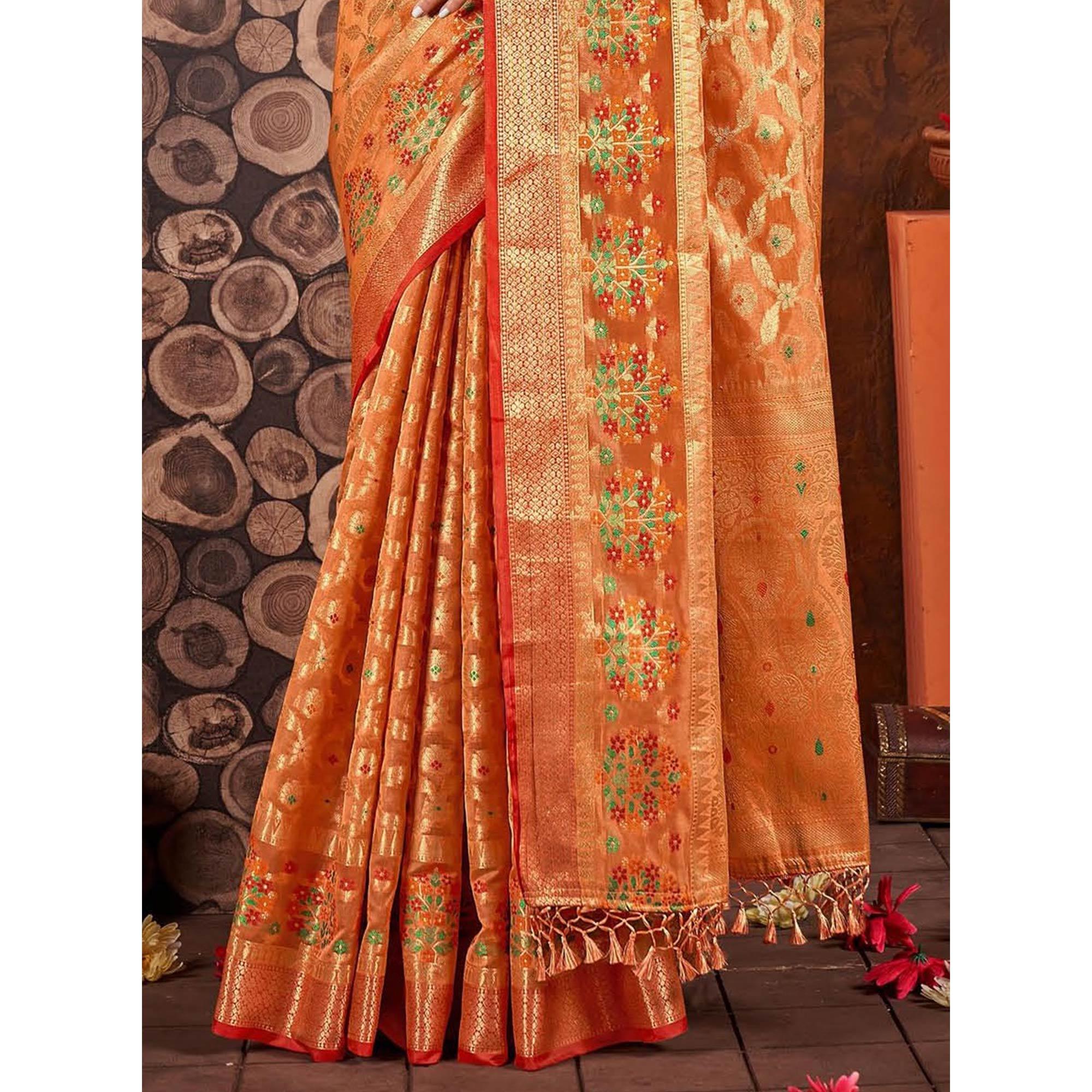 Orange Woven Organza Saree With Tassels - Peachmode