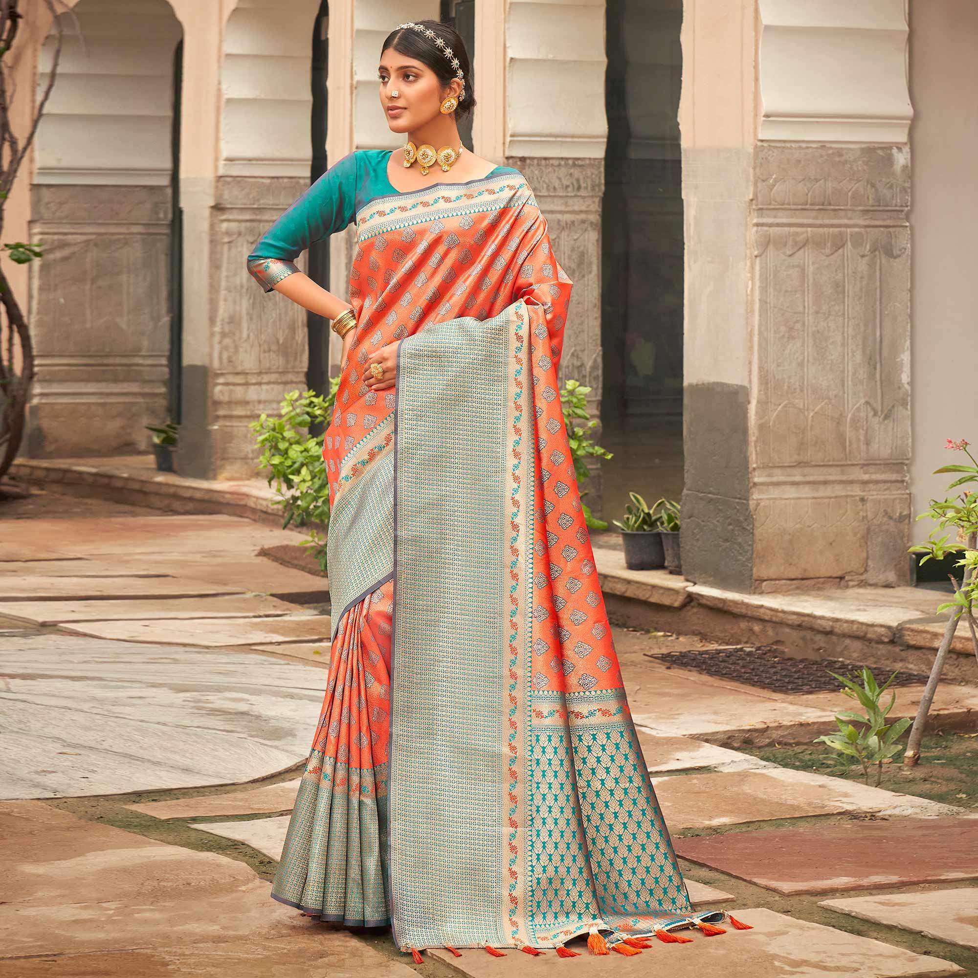 Orange Woven Silk Saree With Tassels - Peachmode
