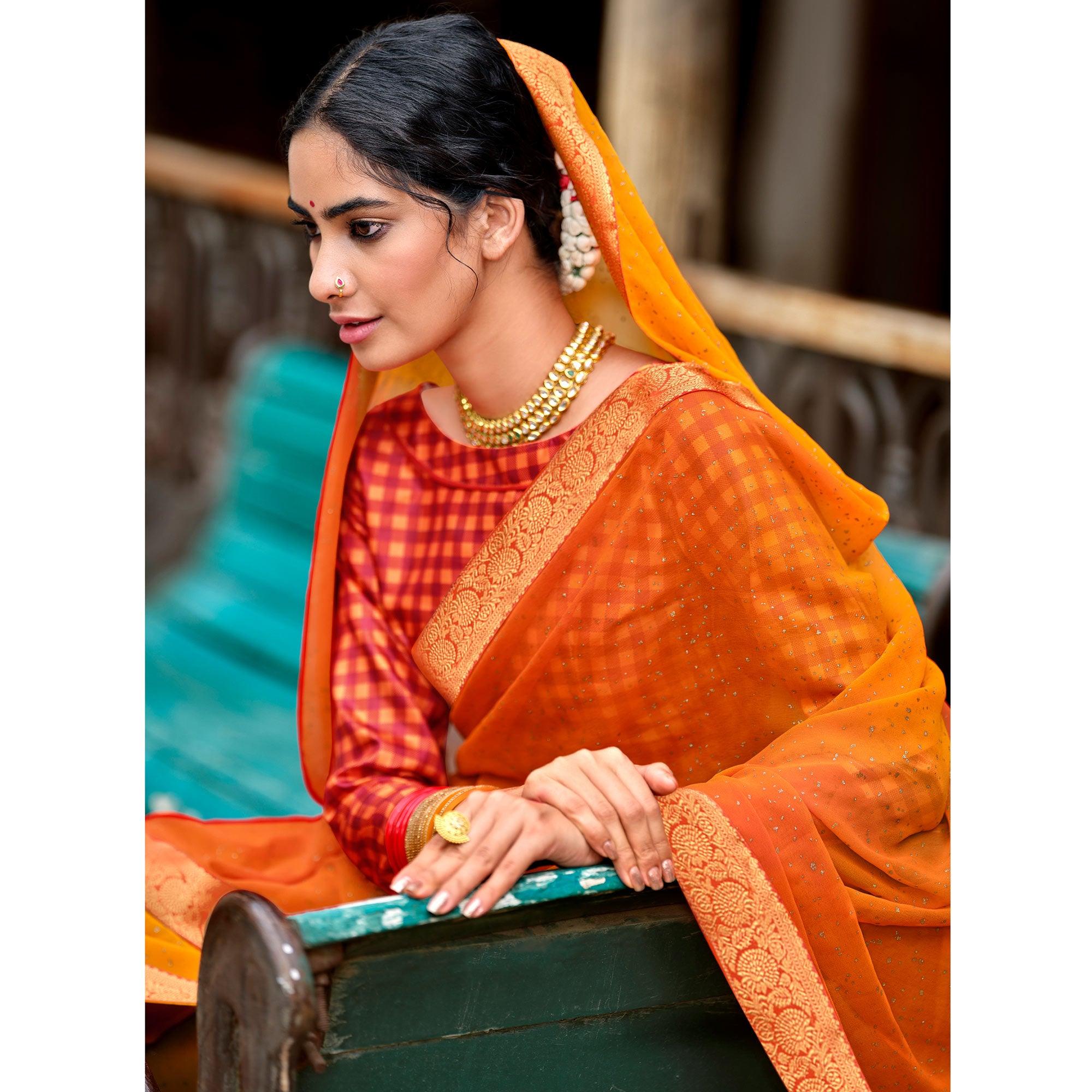 Orange-Yellow Partywear Printed Georgette Saree With Gold Zari - Peachmode