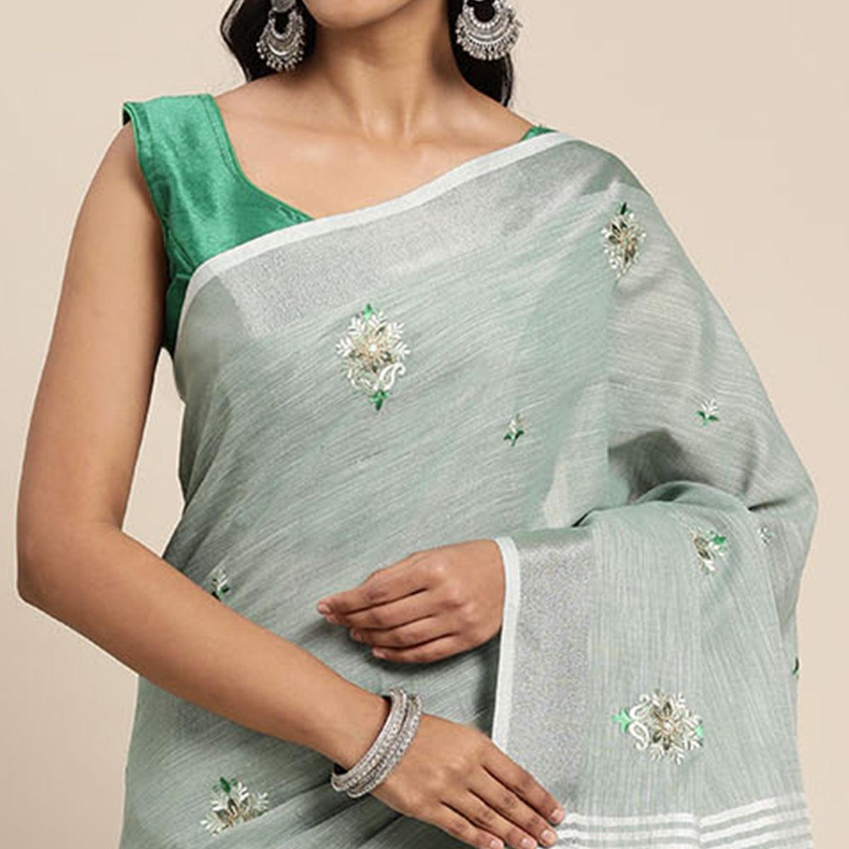 Pastel Green Embroidered Linen Saree With Tassels - Peachmode