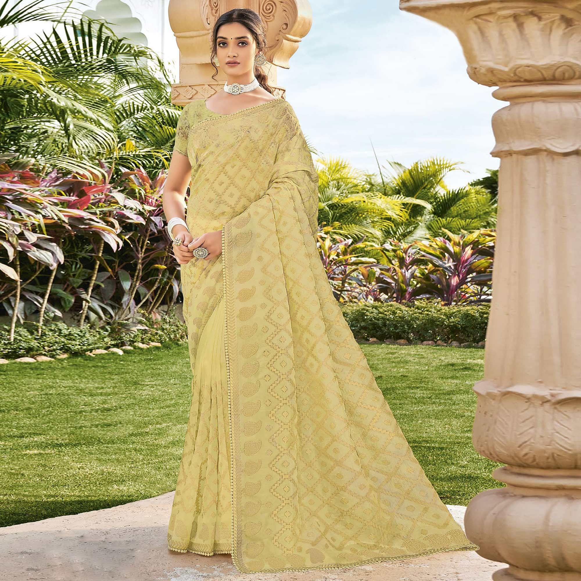 Pastel Green Woven Georgette Saree - Peachmode