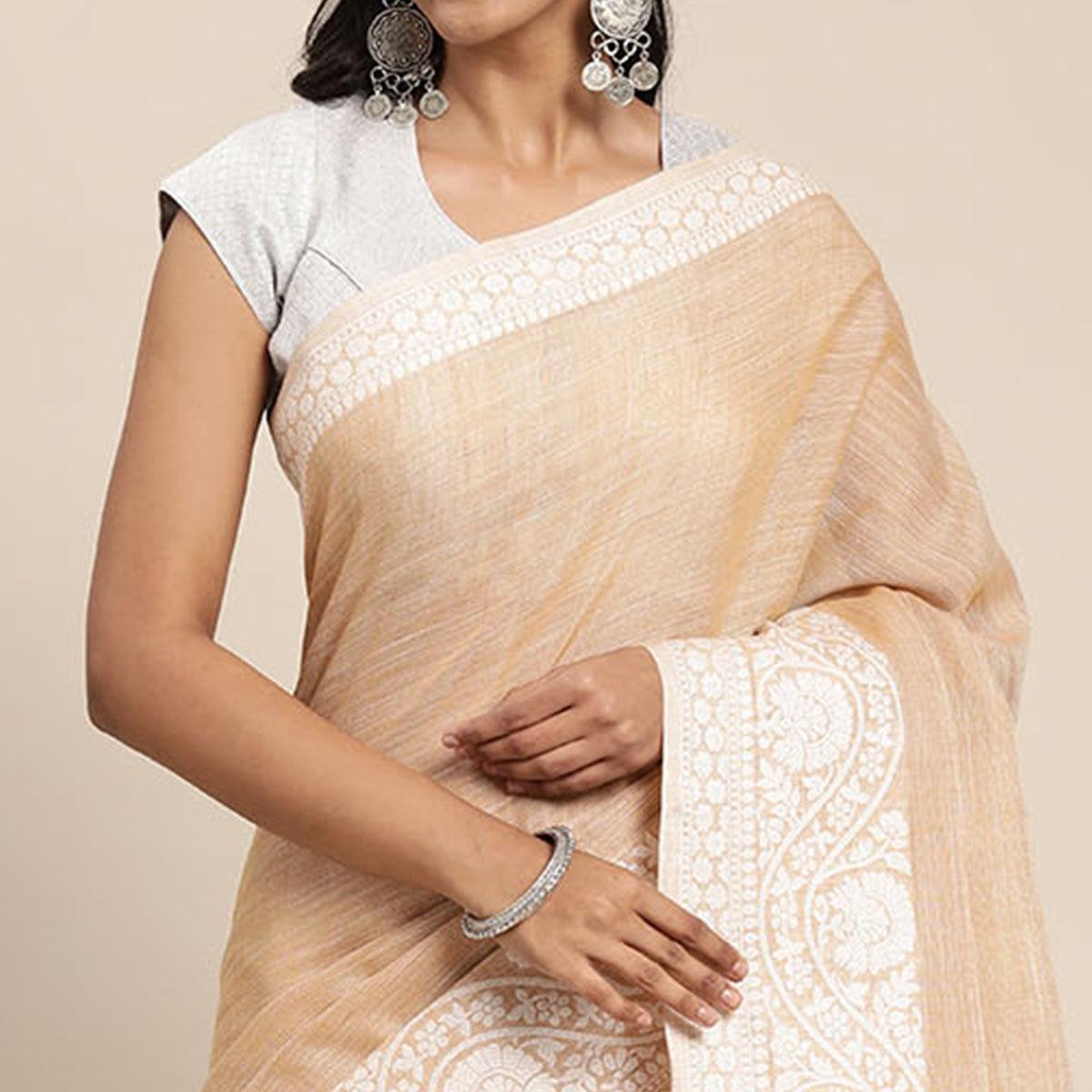 Peach Embroidered Linen Saree with Tassels - Peachmode