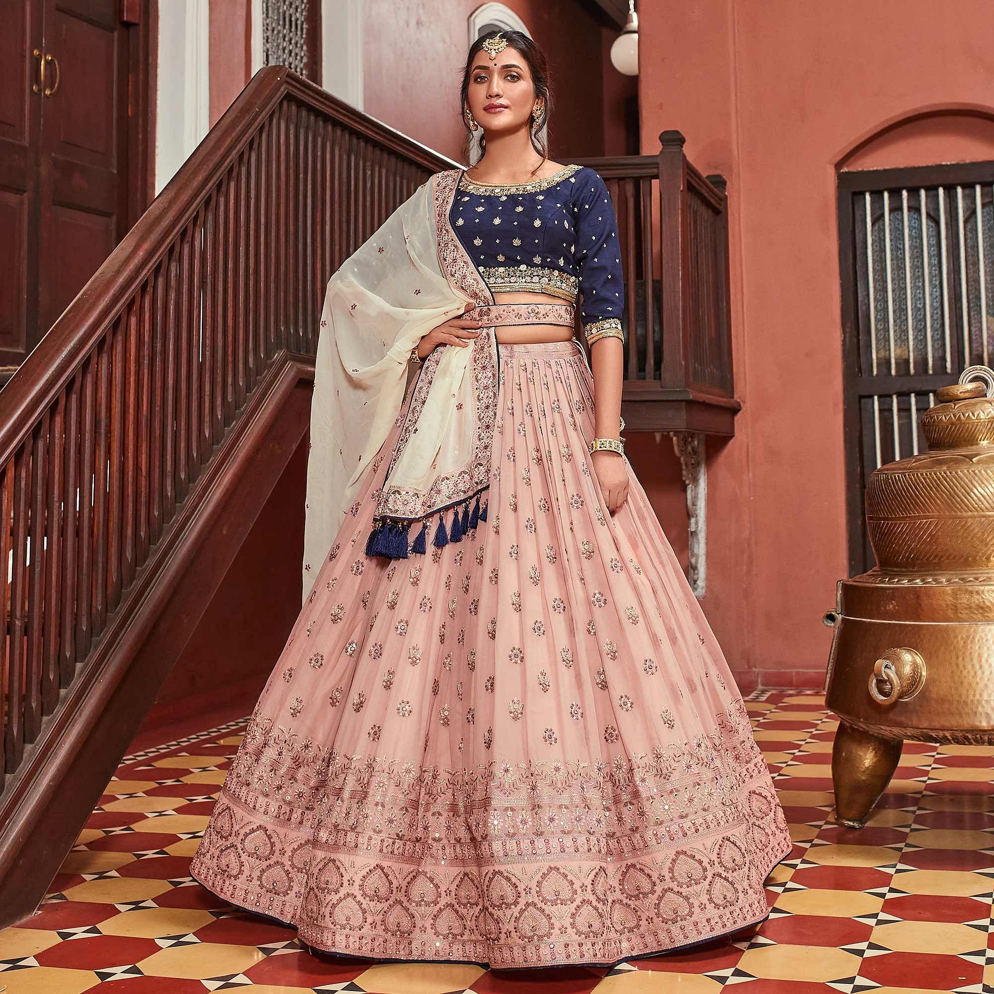 Radiant Pink Colored Designer Embroidered Wedding Wear Raw Silk Lehenga  Saree