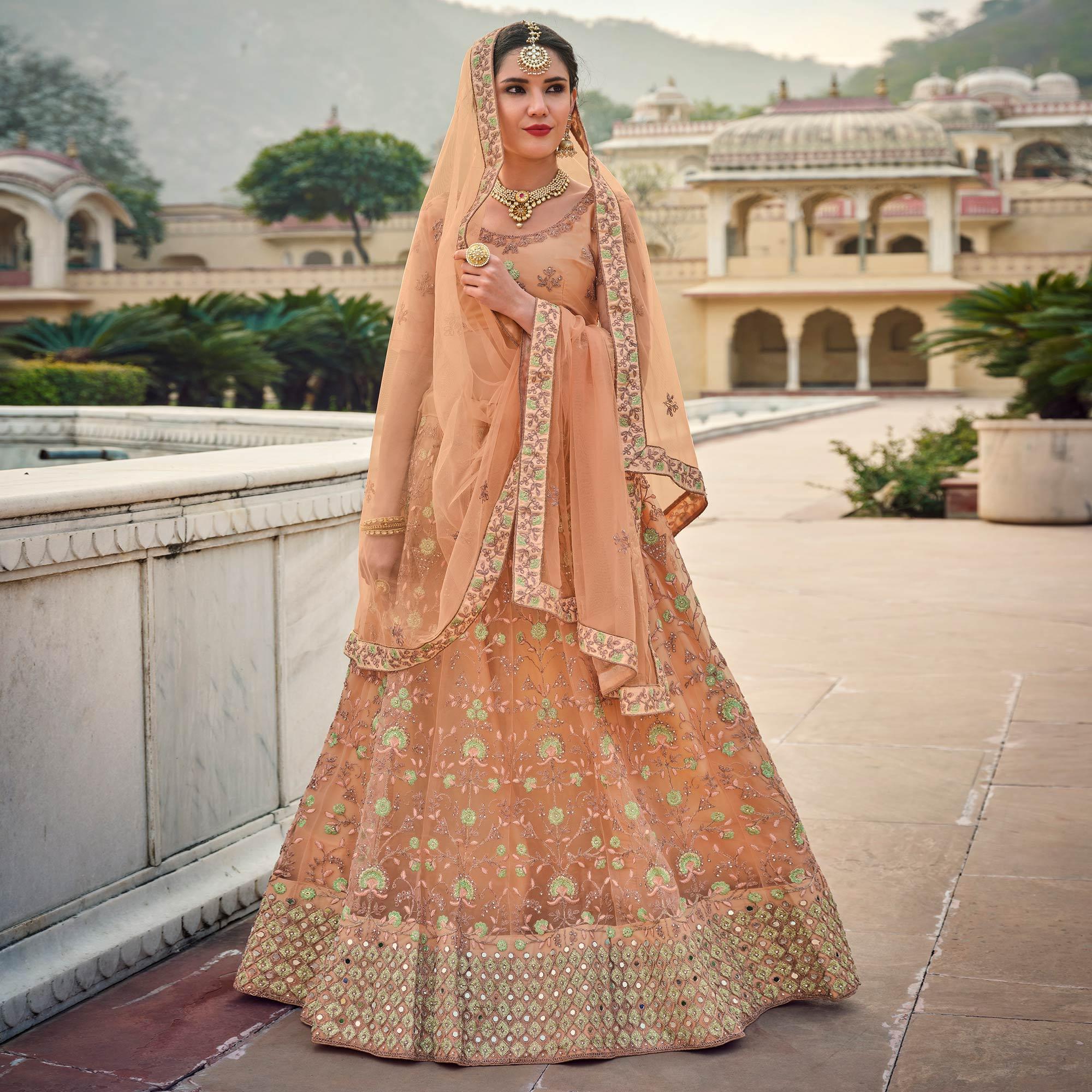 Peach Partywear Embellished & Embroidered Net Lehenga Choli - Peachmode