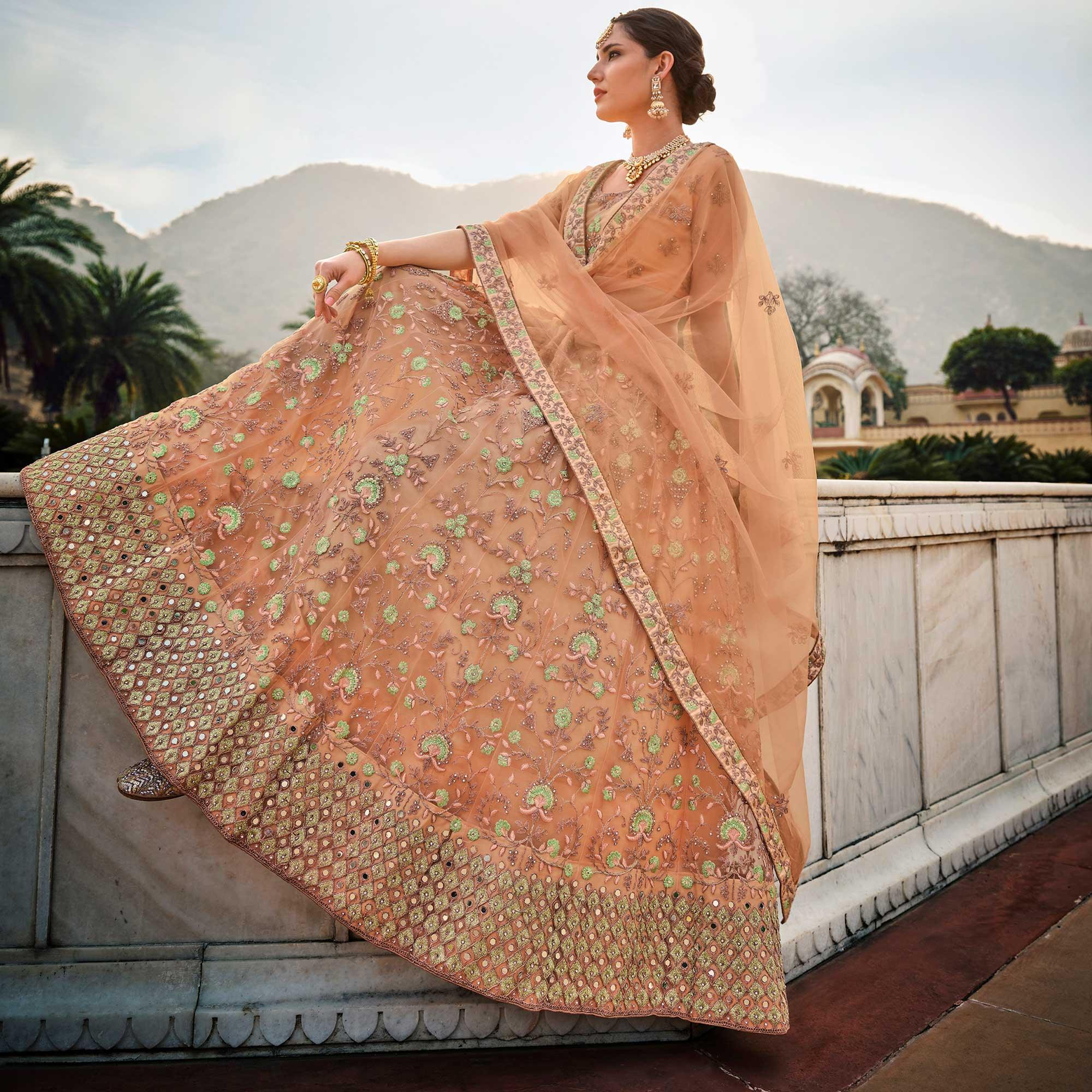 Peach Partywear Embellished & Embroidered Net Lehenga Choli - Peachmode