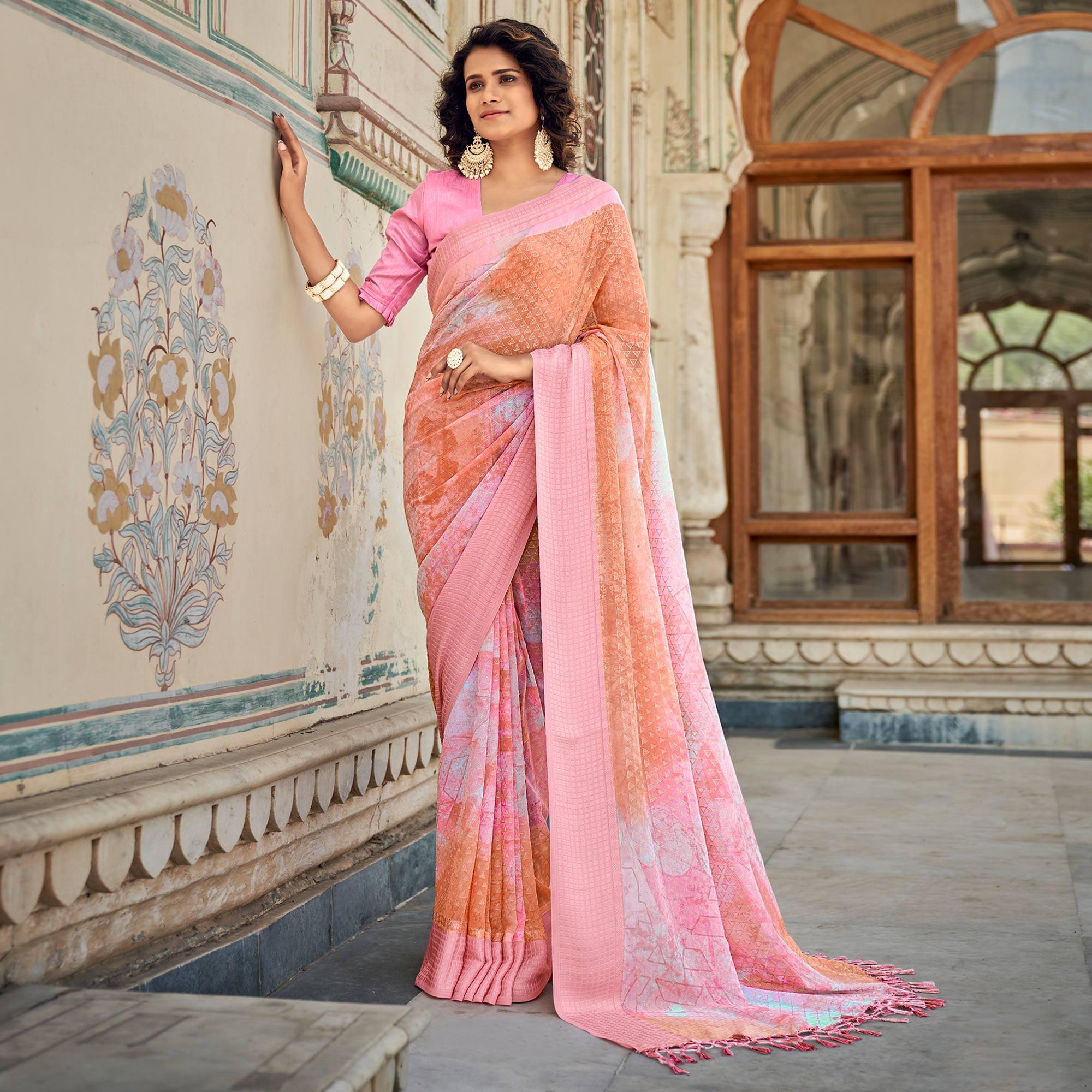 Peach Printed Georgette Saree With Tassels - Peachmode