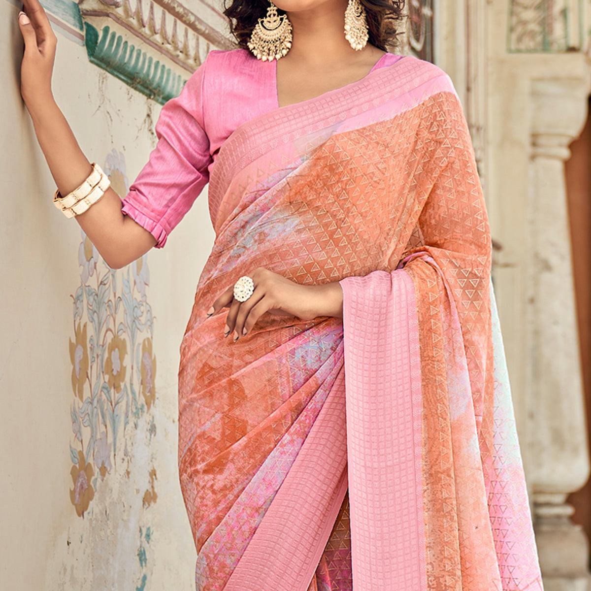 Peach Printed Georgette Saree With Tassels - Peachmode