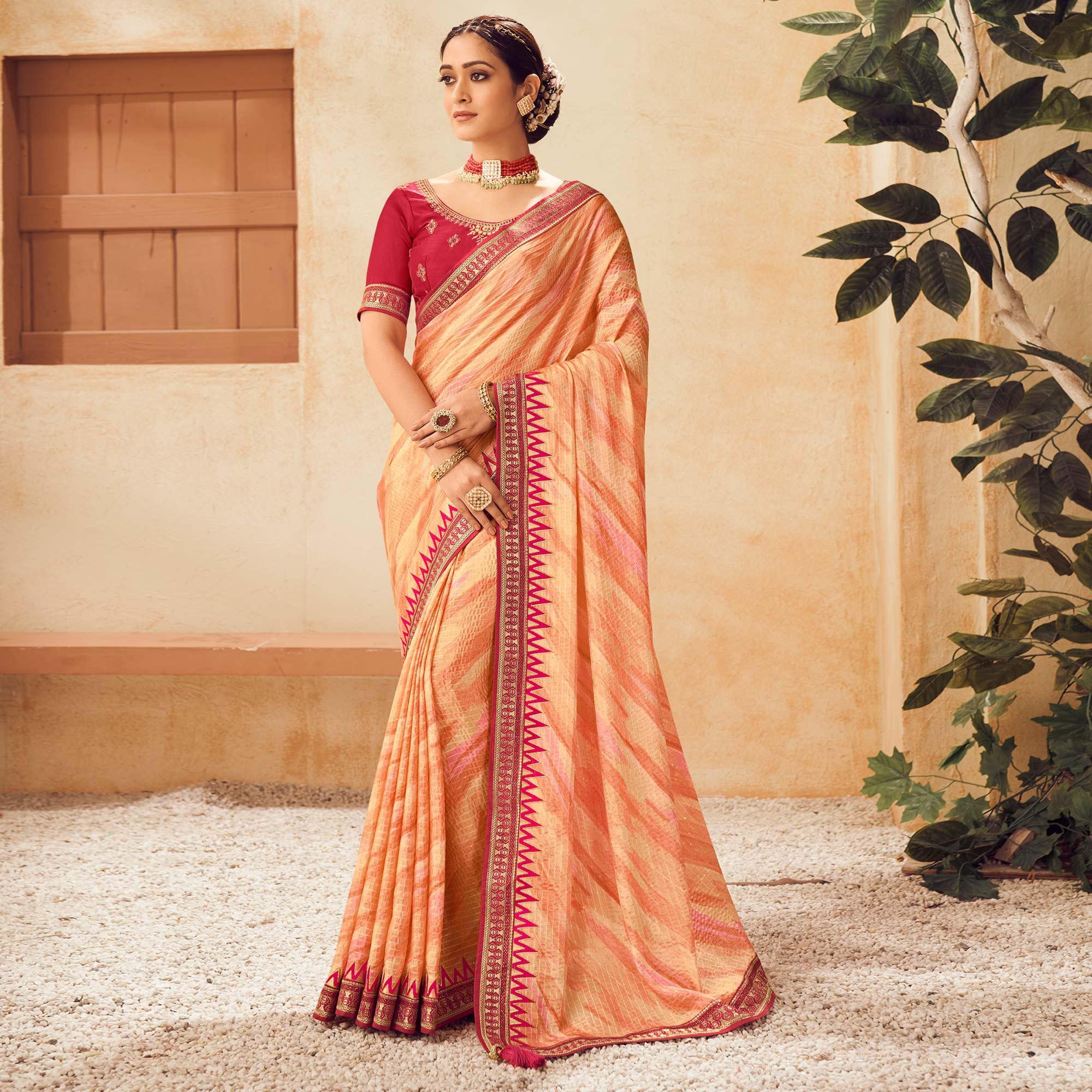 Peach Printed With Embellished Chiffon Saree With Tassels - Peachmode