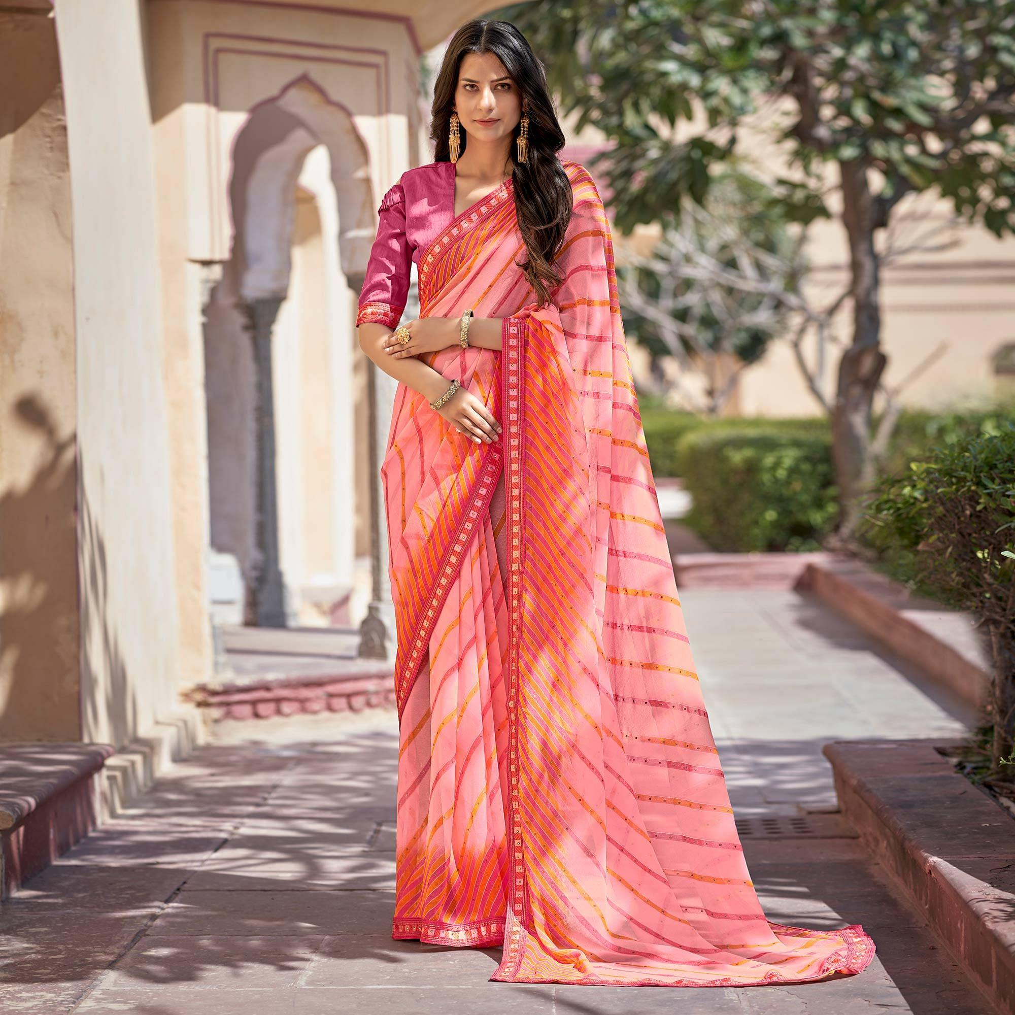 Peach Printed With Embellished Georgette Saree - Peachmode