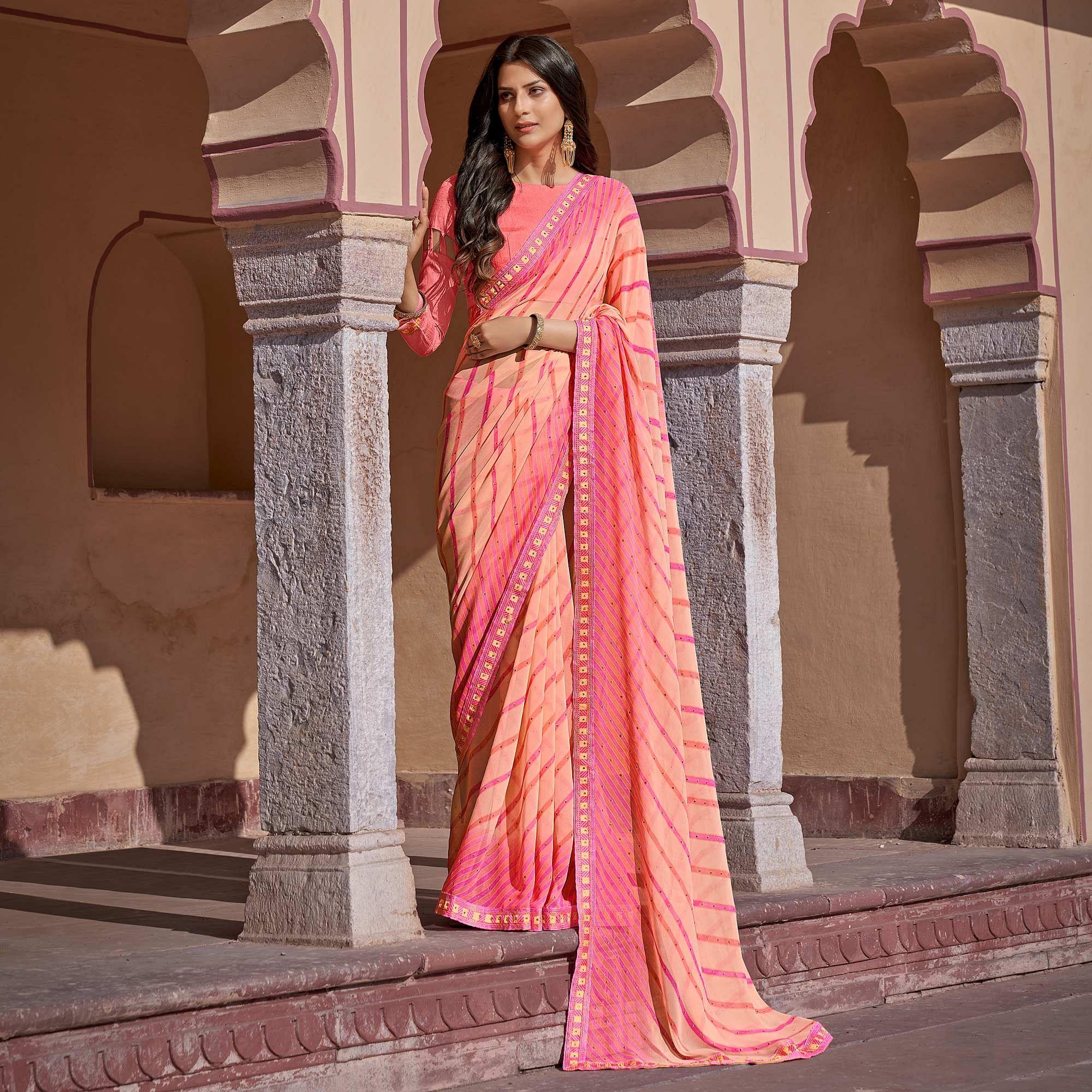 Peach Printed With Embellished Georgette Saree - Peachmode