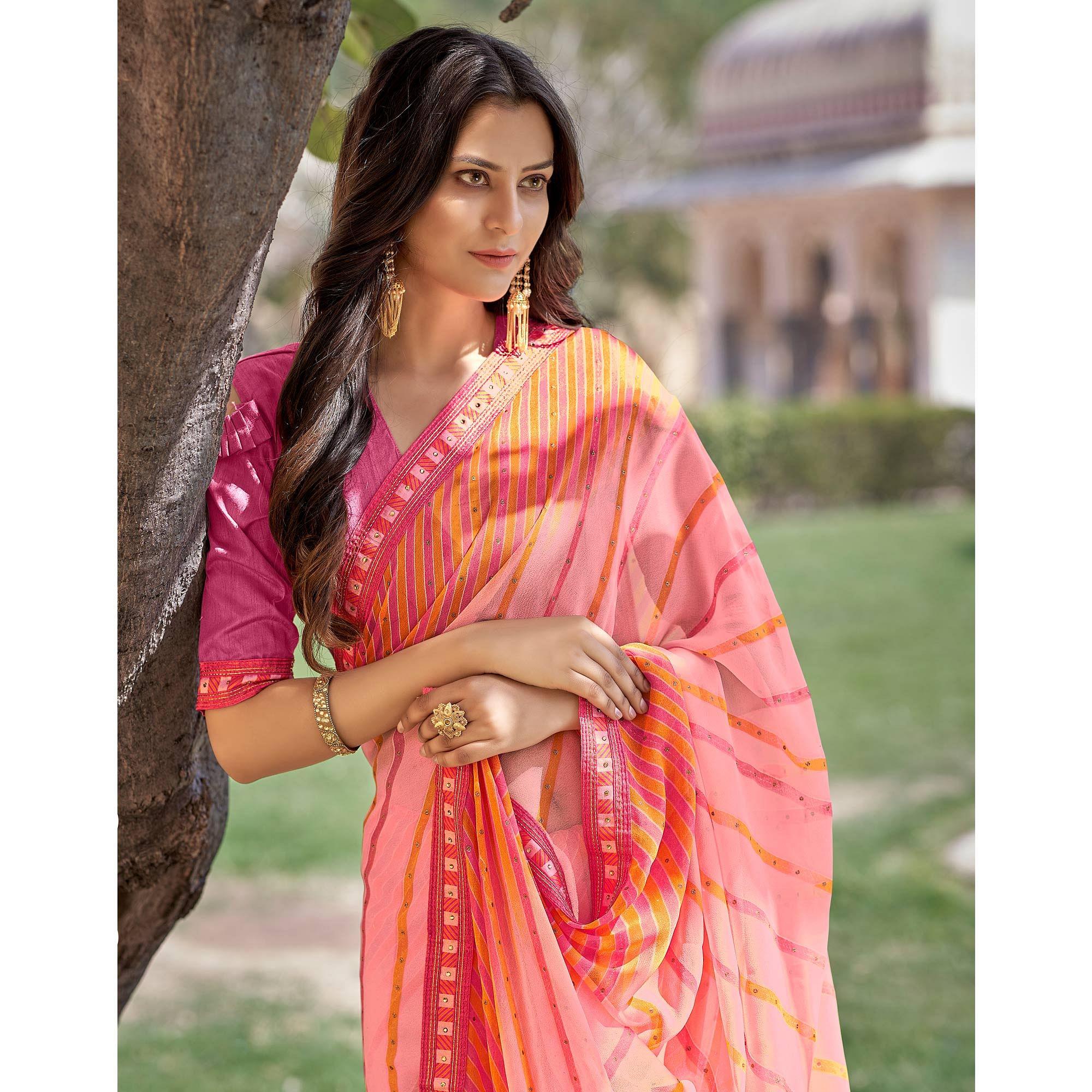 Peach Printed With Embellished Georgette Saree - Peachmode