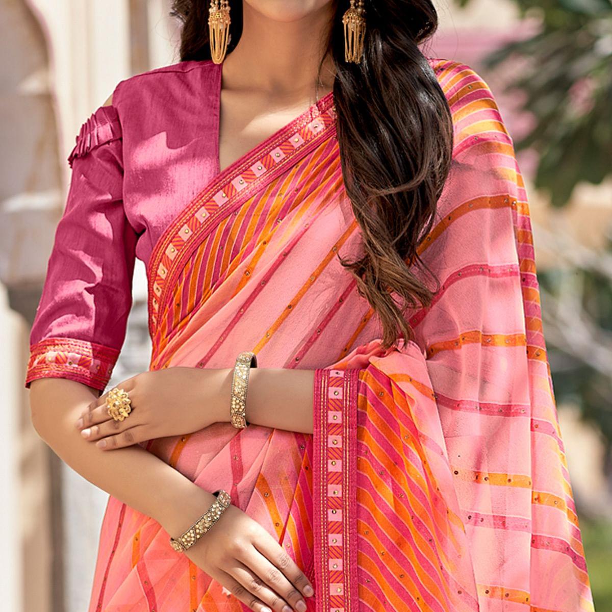 Peach Printed With Embellished Georgette Saree - Peachmode