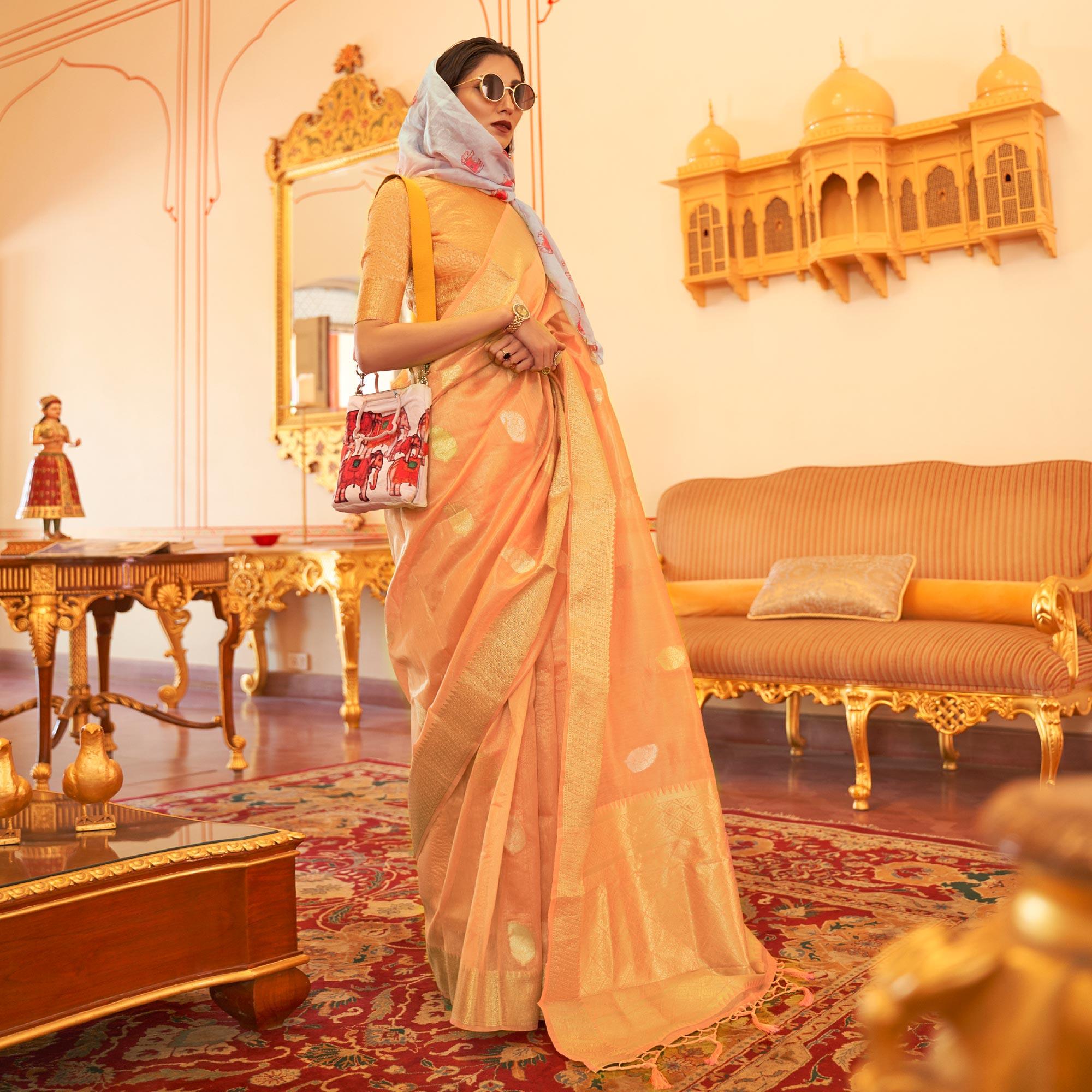 Peach Woven Linen Saree With Tassels - Peachmode