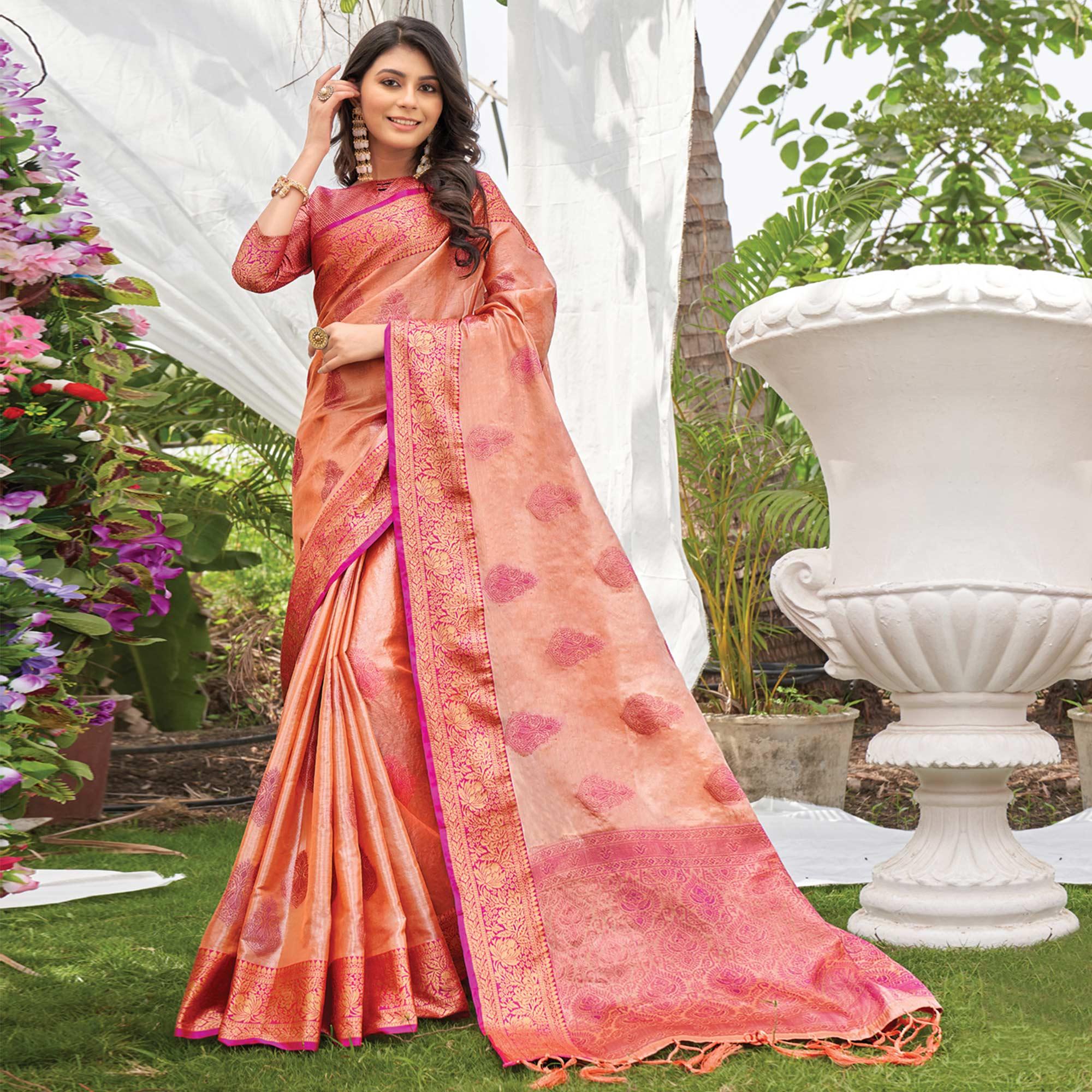 Peach Woven Organza Saree with Tassels - Peachmode