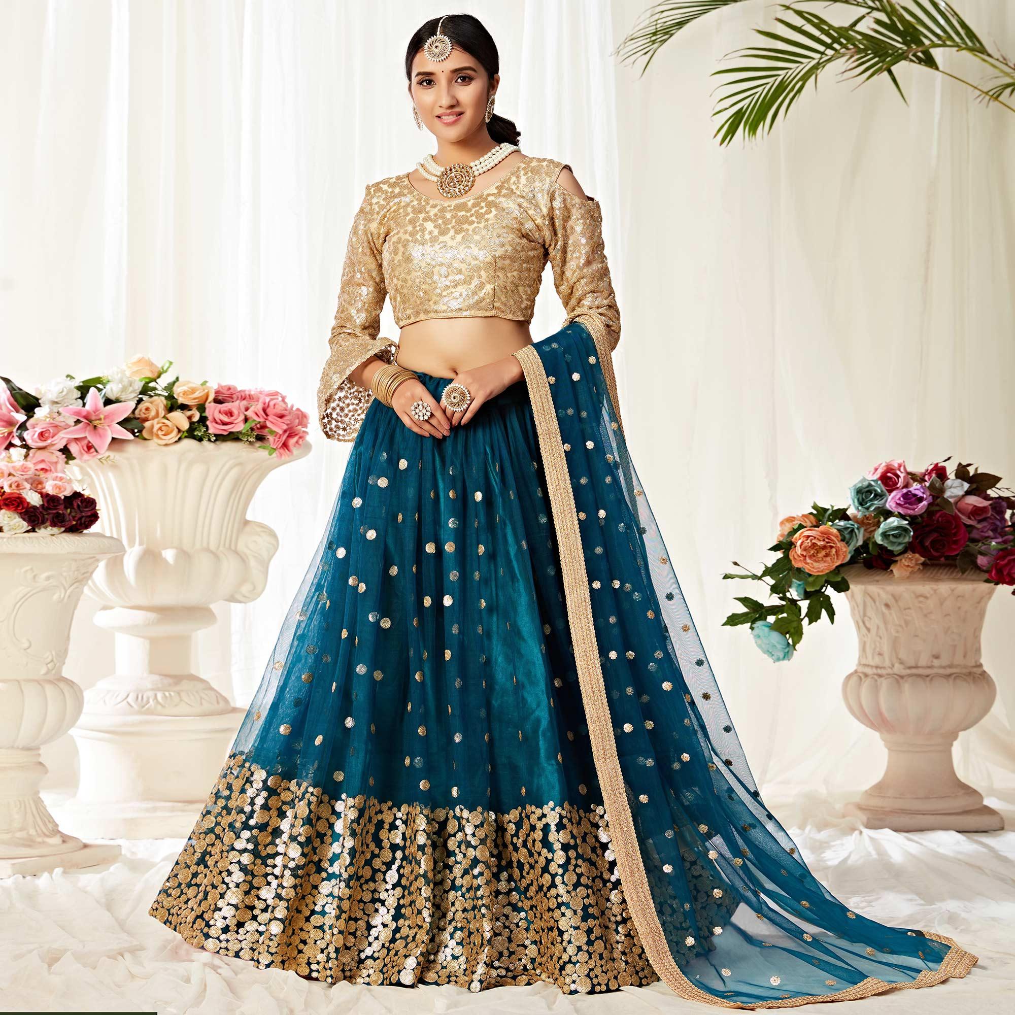 Peacock Blue Partywear Sequined Embroidered Net Lehenga Choli - Peachmode