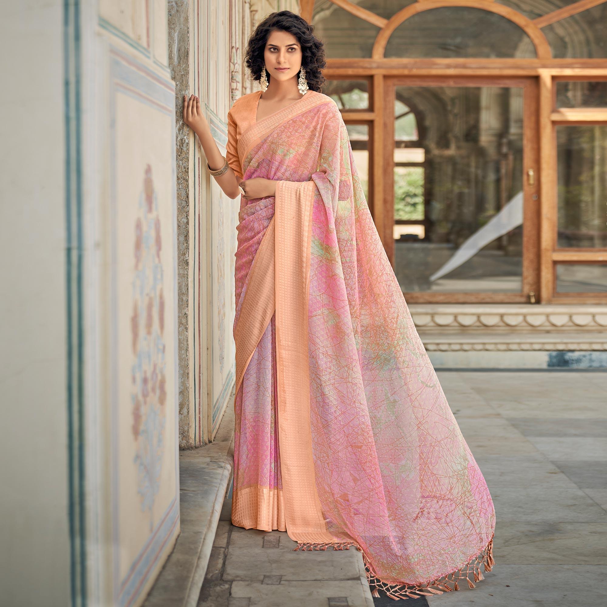 Pink Printed Georgette Saree With Tassels - Peachmode